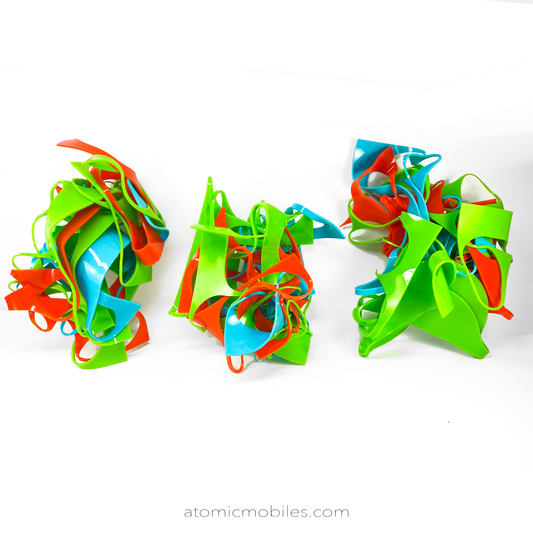 The Sculptura Collection of 3 abstract colorful wall art pieces that are recycled earth friendly one of a kind art pieces in Lime Green, Aqua Blue, and Orange by AtomicMobiles.com