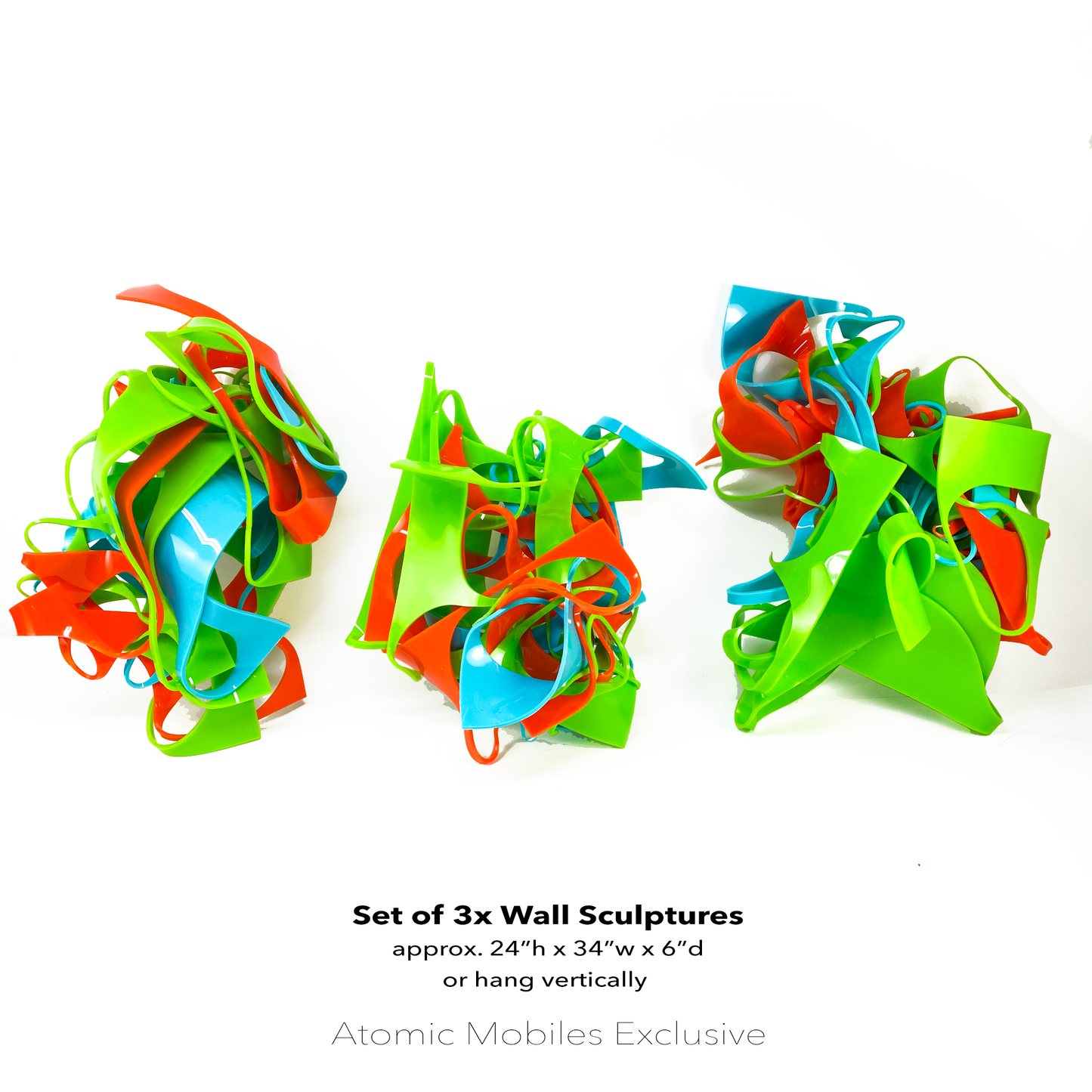 Set of 3 Colorful 3D wall art hanging in a horizontal row in Palm Springs Colors of Lime Green, Aqua Blue, and Orange - recycled acrylic abstract 3D wall art by AtomicMobiles.com