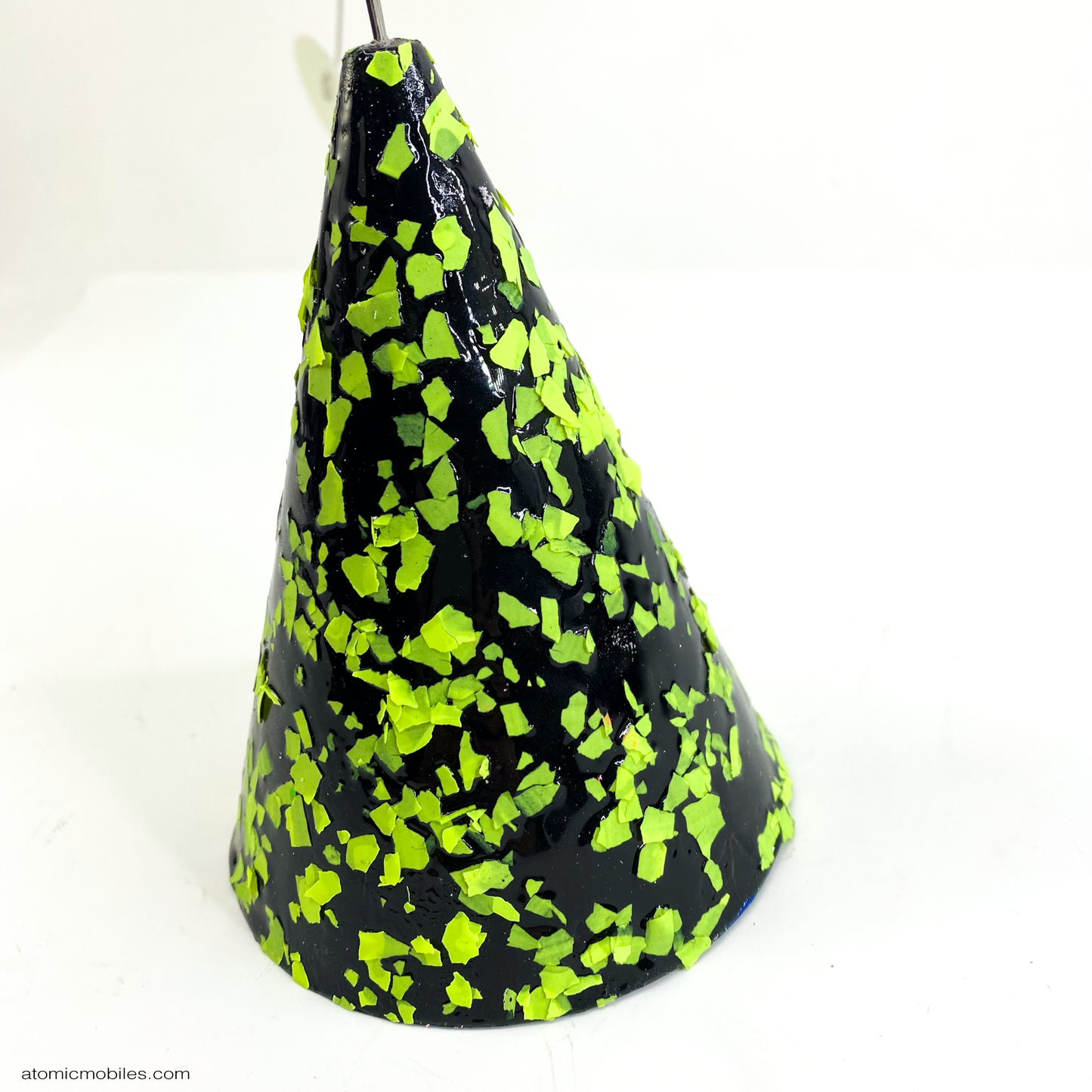 Closeup of Strobile modern art stabile - tabletop mobile - featuring glossy black undercoat and lime green speckles that glow under a black light by AtomicMobiles.com