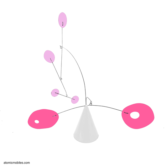 The Strobile Art Stabile mobile in Barbie hot pink and pink shapes with white base cone - one of the Dream House art pieces by AtomicMobiles.com