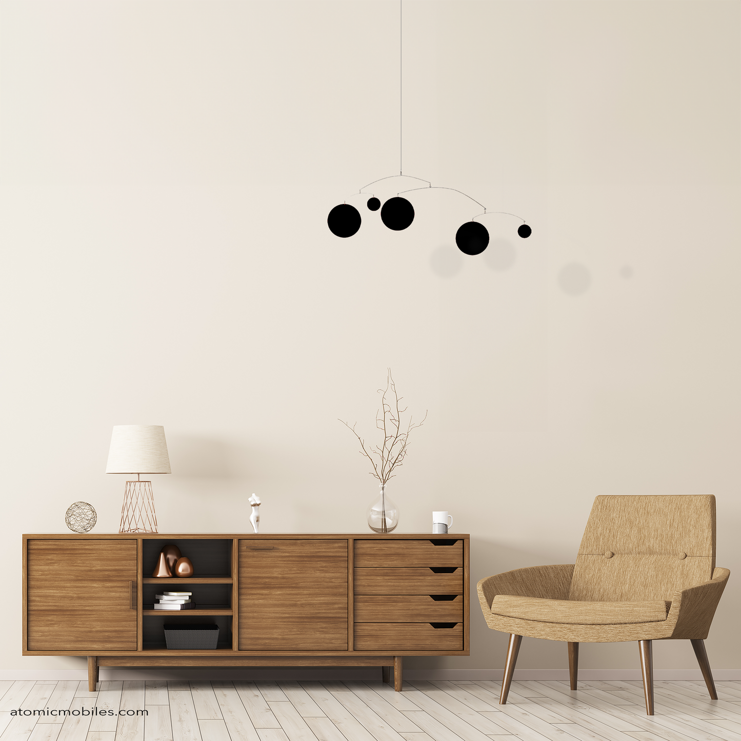 Happiness hanging art mobile in all black in mid century modern room with credenza and tan MCM chair - mobile by AtomicMobiles.com