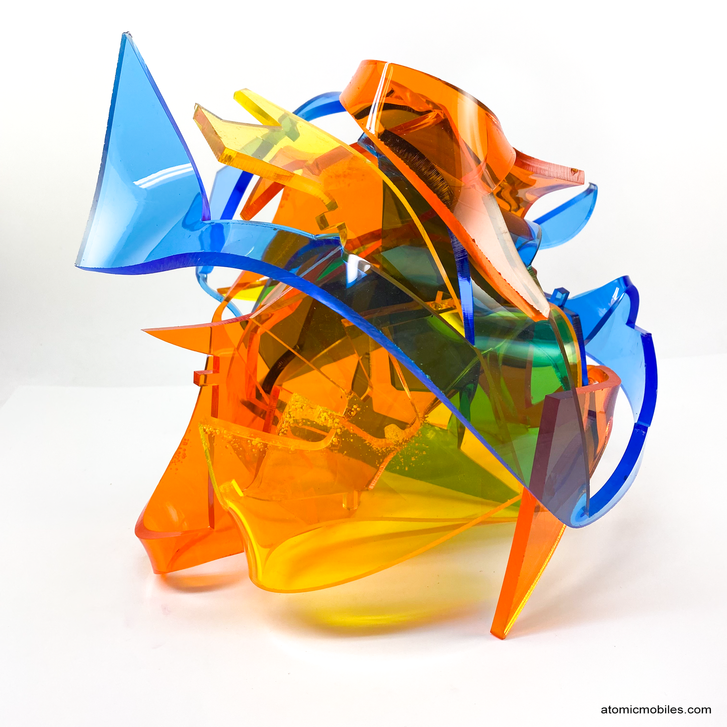 Side view of Euphoria - mesmerizing Colorful abstract plexiglass acrylic abstract art sculpture in tranparent orange, yellow, blue - one of a kind modern art by AtomicMobiles.com