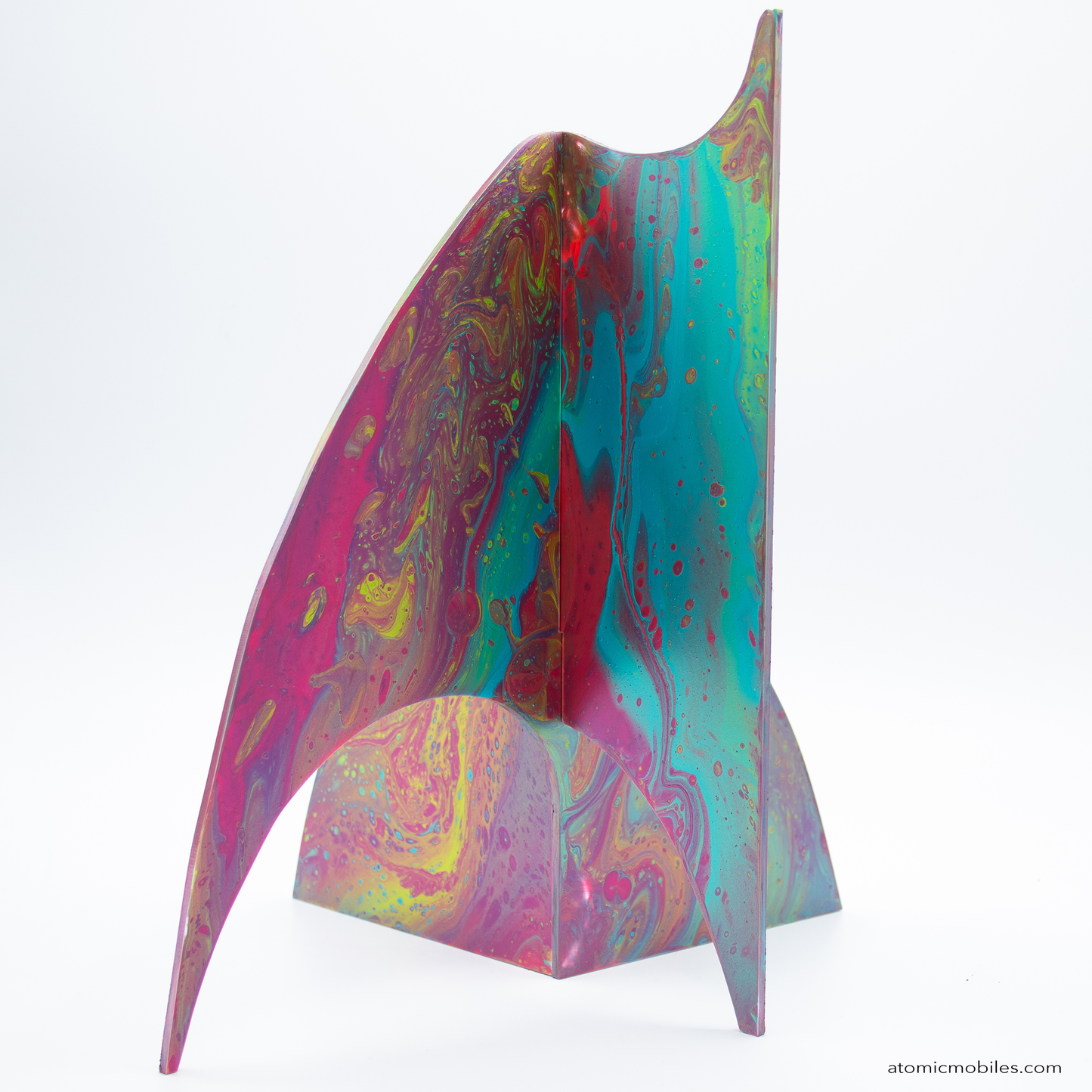 Closeup of gorgeous hand-painted Moderne Kinetic Art Sculpture, tabletop mobile, in vibrant swirly colors in red, blue, green, and yellow by AtomicMobiles.com
