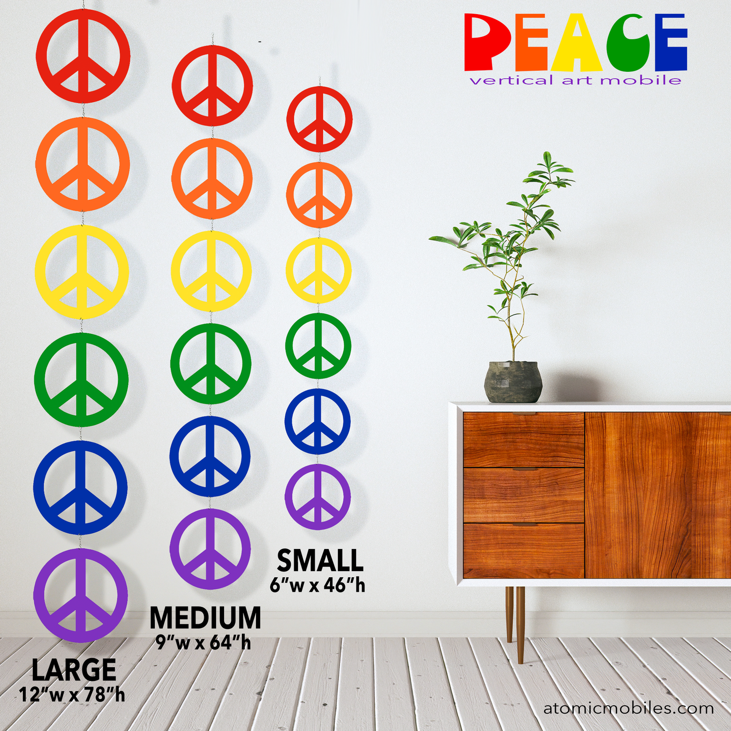 Size Examples for LGBTQ+ Pride Peace Mobile by AtomicMobiles.com - calm mid century room with modern credenza and plant with wood floor and 3 sets of Peace Sign Kinetic Hanging Art Mobiles