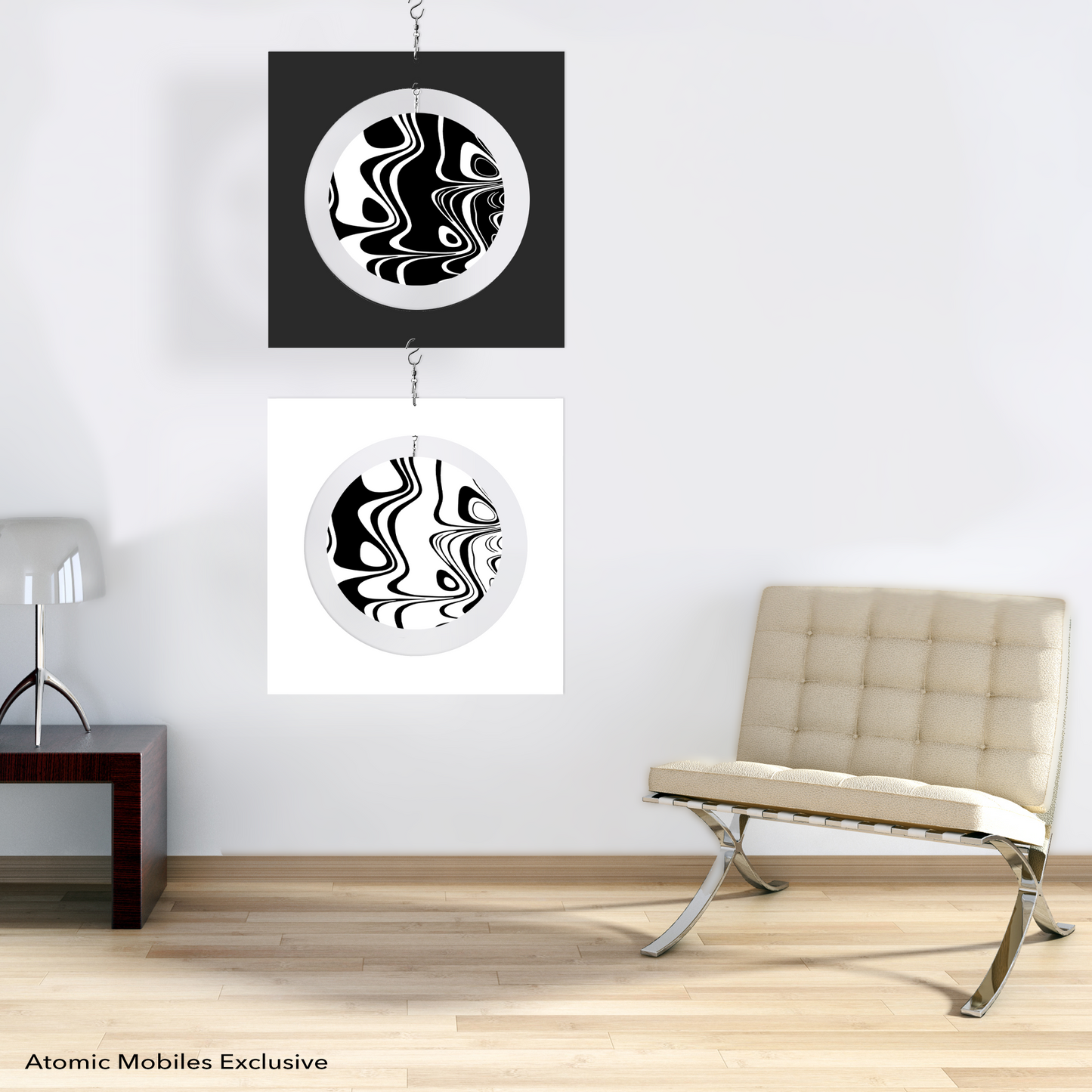 Groovy retro kinetic art panels with 3D art made in acrylic plexiglass in modern minimalist room - hanging art mobile in 2 black and white panels by AtomicMobiles.com