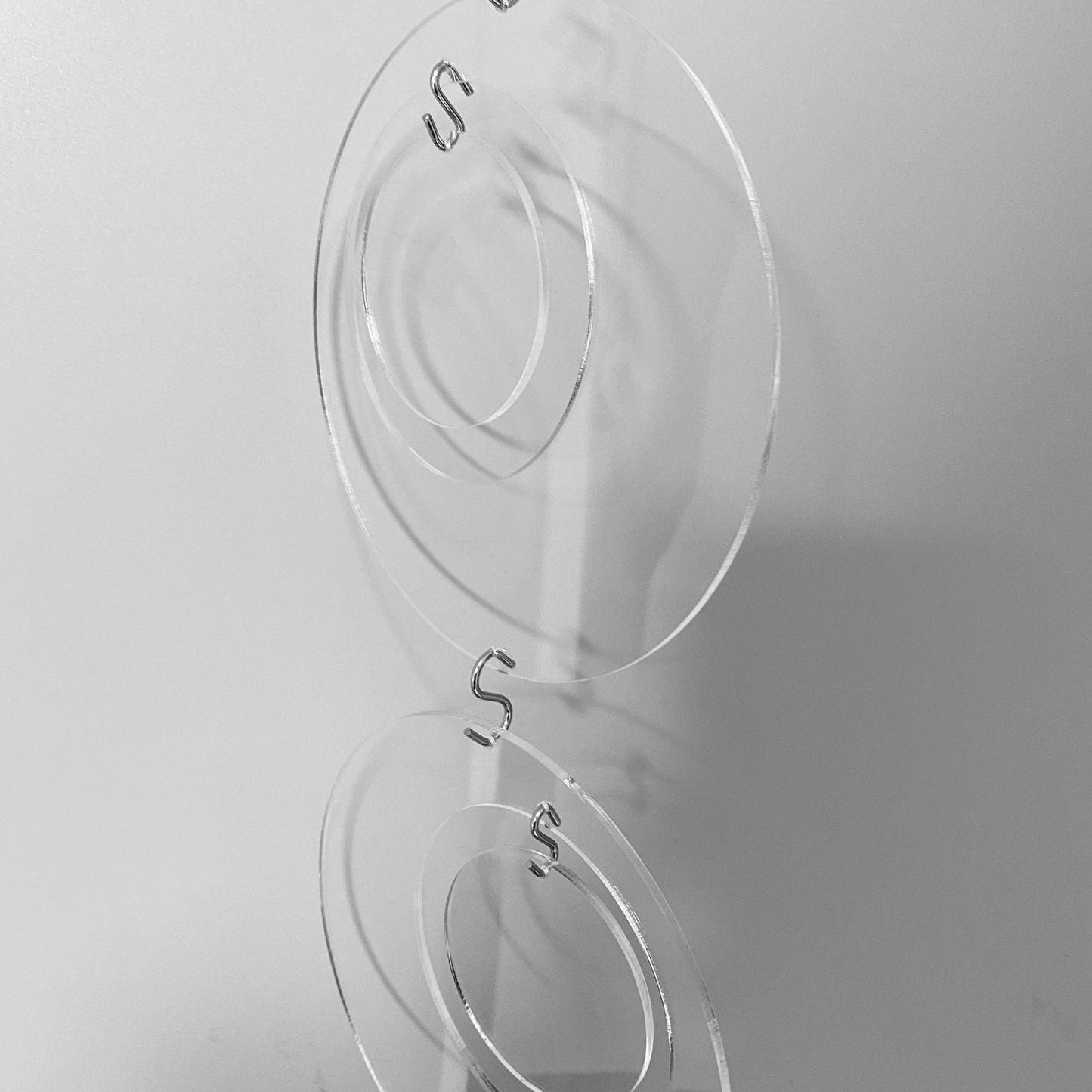 Side view of Groovy DIY KIT for mobiles, room dividers, and curtains in Clear Lucite Acrylic by AtomicMobiles.com