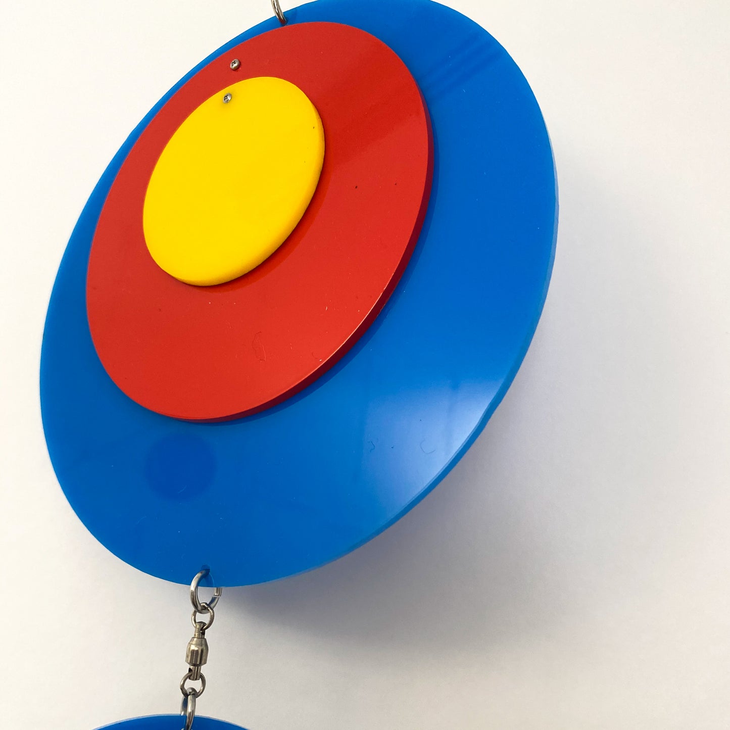Beautiful Groovy Twirly Blue Multi Color Vertical Kinetic Mobile in Blue Red and Yellow by AtomicMobiles.com