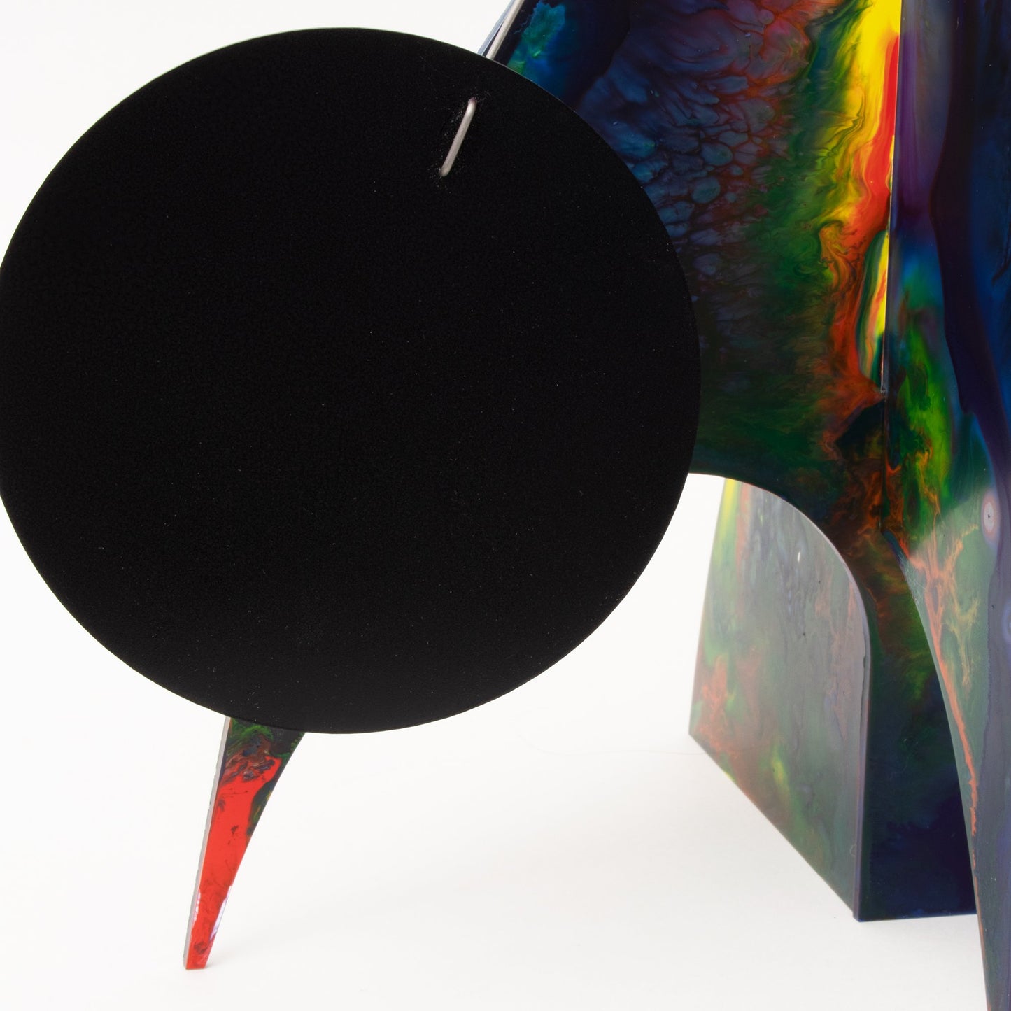 Closeup of dark red, blue, yellow, green modern kinetic art sculpture stabile - one of a kind hand painted stabiles by AtomicMobiles.com