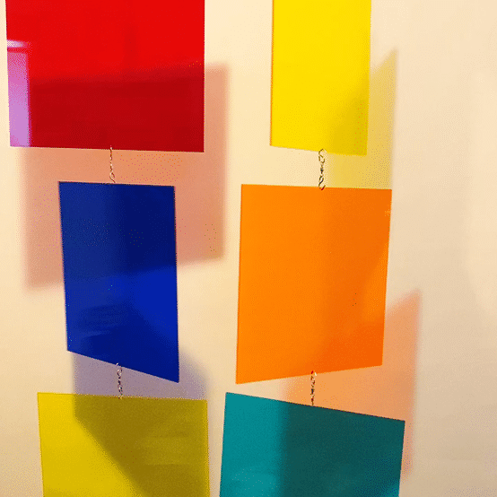 MODcast in clear red, navy blue, orange, yellow, and teal room dividers - animated gif - atomicmobiles.com
