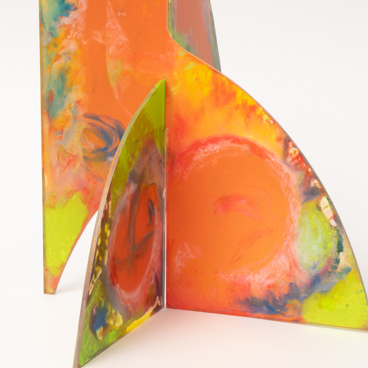 Closeup of burst of color in this abstract kinetic art stabile - handpainted one of a kind - modern sculpture by AtomicMobiles.com