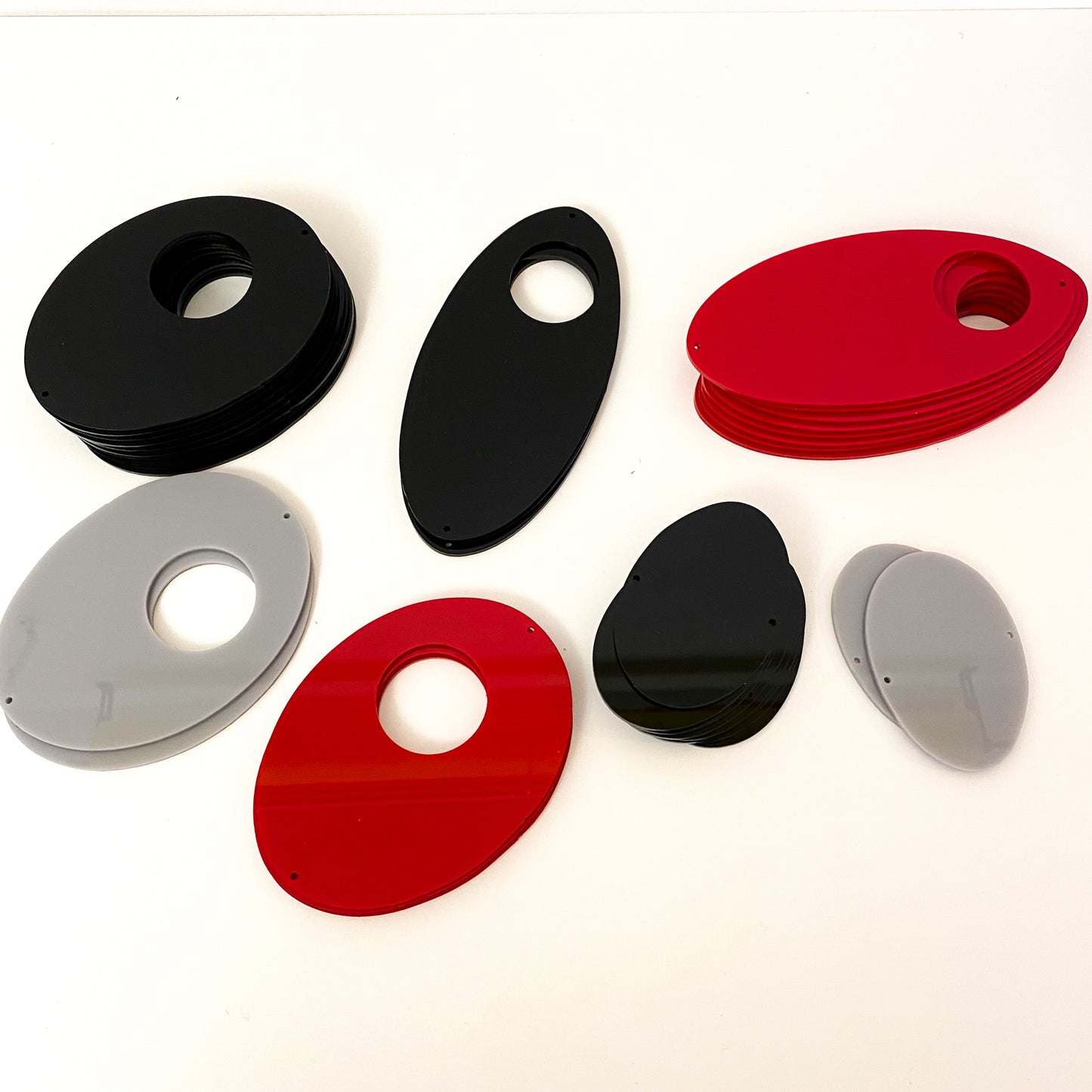 Parts for cool retro kinetic art piece DIY Kit in red and black for wall art, mobiles, or room dividers by AtomicMobiles.com