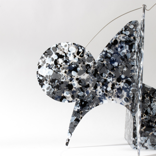 Side view of The Moderne Modern Art Stabile Sculpture in intriguing black, white, and gray abstract colors - handmade modern tabletop mobile by AtomicMobiles.com