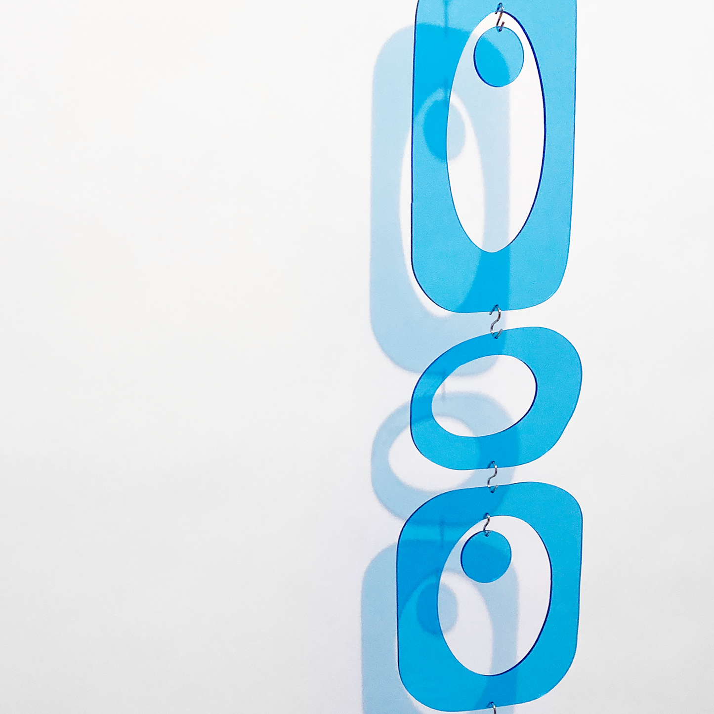 Clear Light Blue Beatnik Party Atomic Kits Parts for retro mid century modern room dividers, partitions, curtains, and mobiles in clear plexiglass acrylic by AtomicMobiles.com