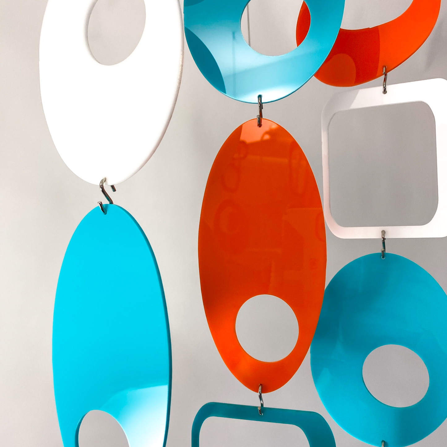 Close up of Palm Springs Colors of Orange, Aqua, and White - DIY Kit to make room divider, window treatment, wall art, or mobile! by AtomicMobiles.com