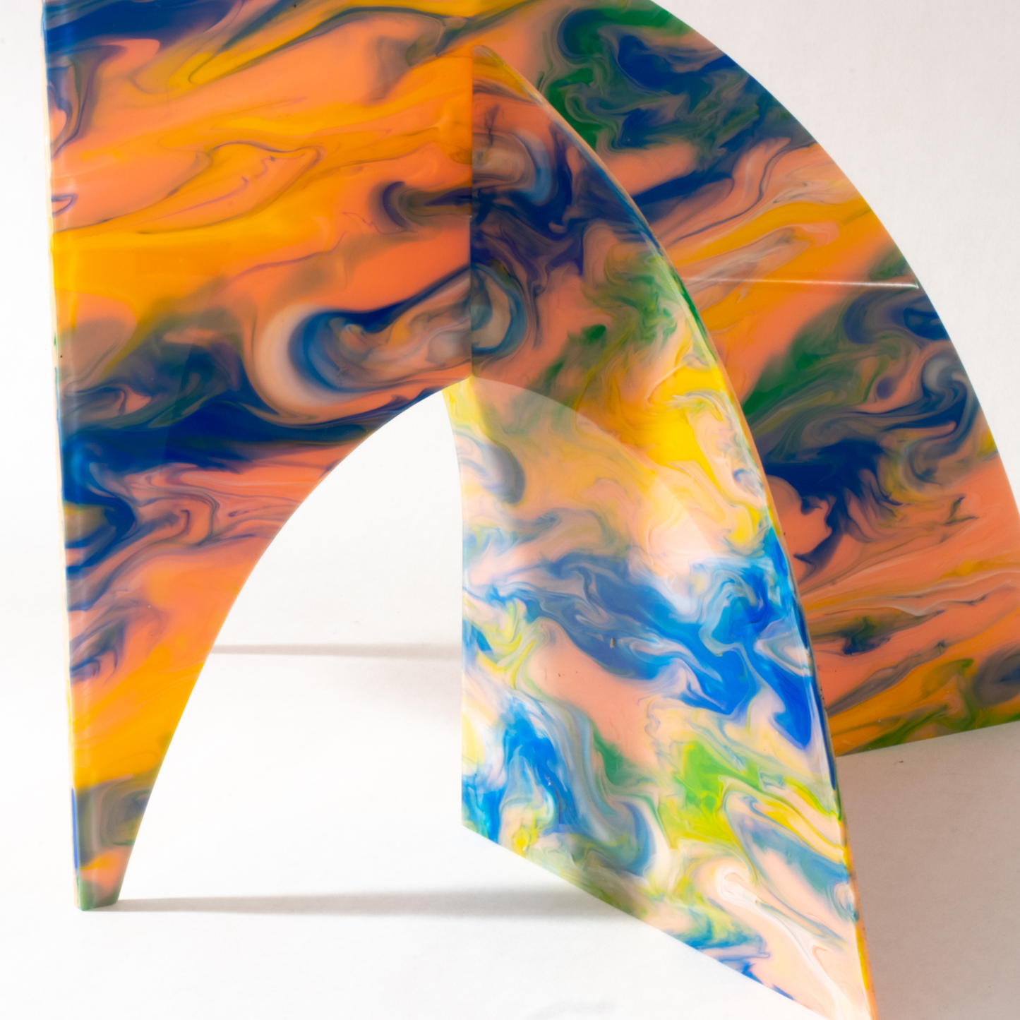 Closeup of base of Peachy Moderne Art Stabile with beautiful swirls of green, orange, pink and green colors by AtomicMobiles.com