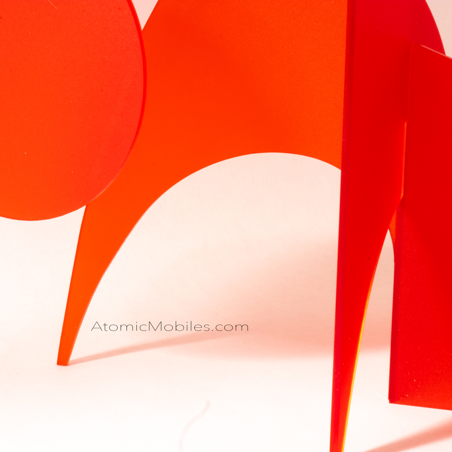 Closeup of Moderne Monochrome Red - Frosty Red modern art sculpture stabile - tabletop mobile - handmade in Los Angeles by AtomicMobiles.com