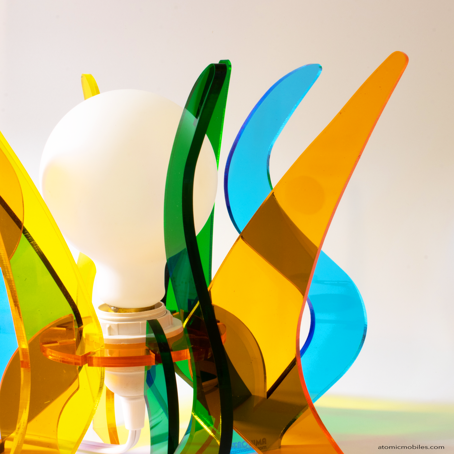 ASTROLuma Space Age Lamp in Genie Style in clear acrylic multicolors by AtomicMobiles.com