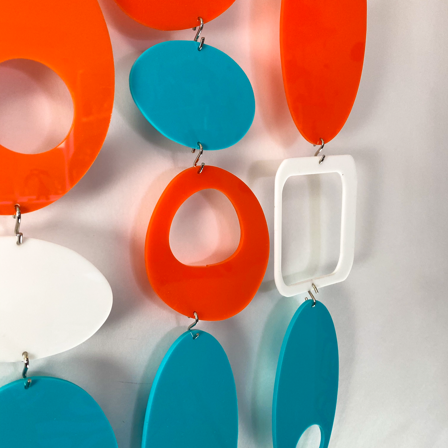Closeup of Palm Springs Colors of Orange, Aqua, and White - DIY Kit to make room divider, window treatment, wall art, or mobile! by AtomicMobiles.com
