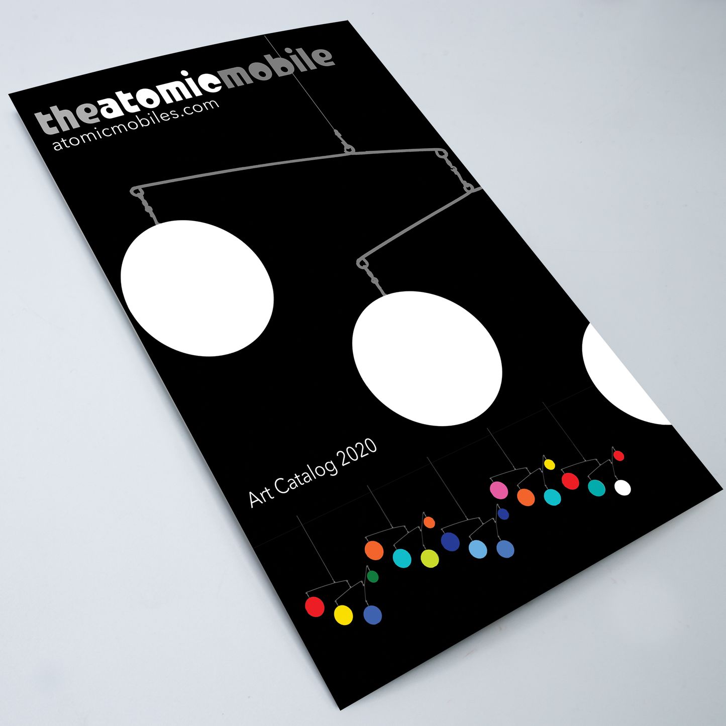 FREE 2020 Atomic Mobiles Art Catalog with earring purchase by AtomicMobiles.com
