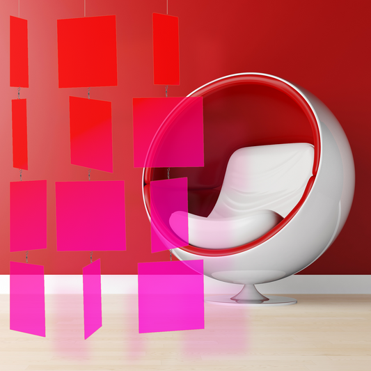 Neon fluorescent hot pink MODcast kinetic hanging art mobile in front of mod retro red and white egg chair - mid century modern style mobiles by AtomicMobiles.com