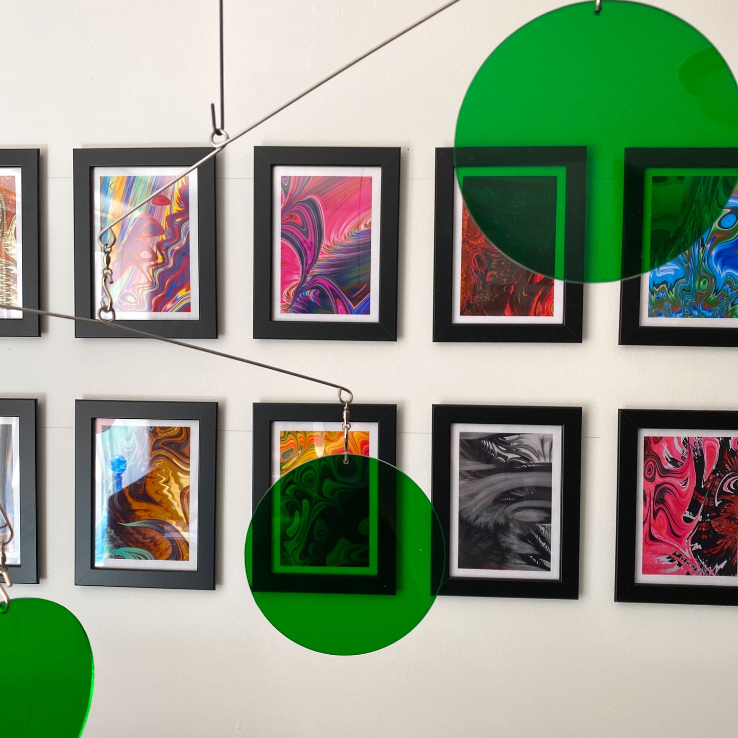 Clear Green Acrylic Atomic Mobiles in front of MiniMOD abstract colorful art prints by AtomicMobiles.com