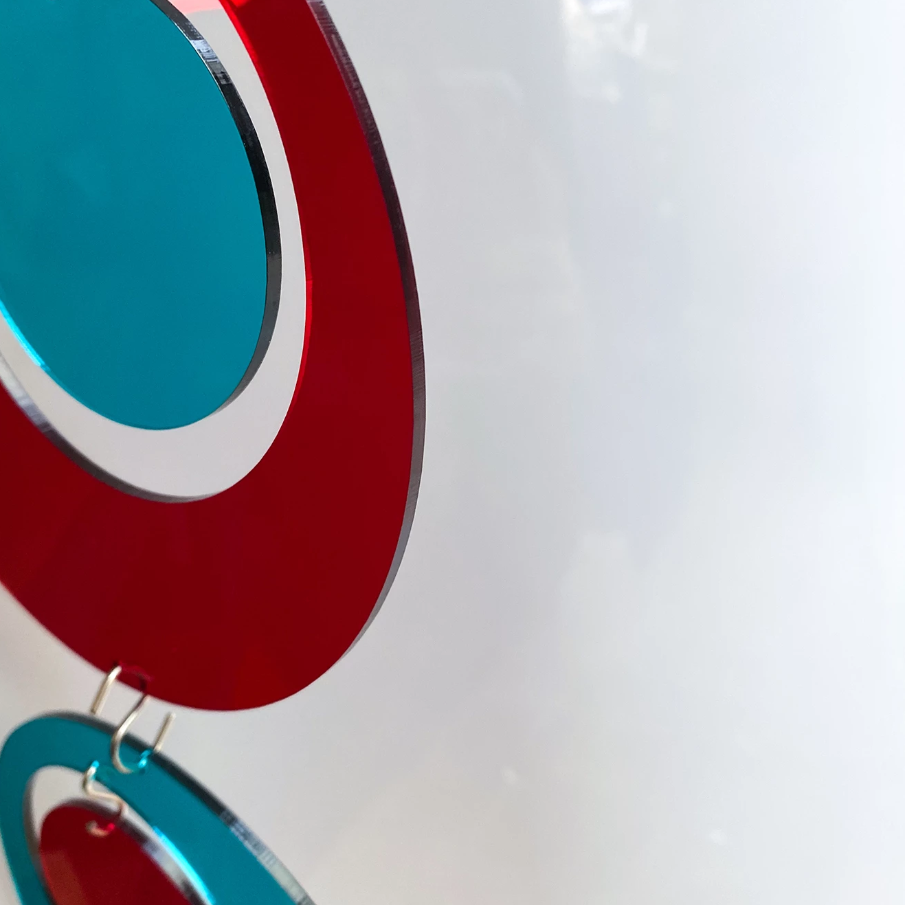 Groovy Atomic Room Divider Kits in Clear Colors of Red and Teal by AtomicMobiles.com