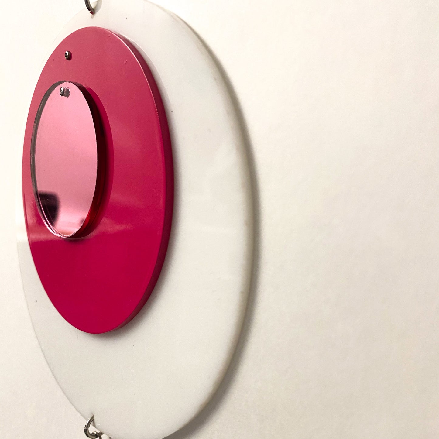 Side closeup of Groovy DOTS in white, hot pink, and pink mirror by AtomicMobiles.com
