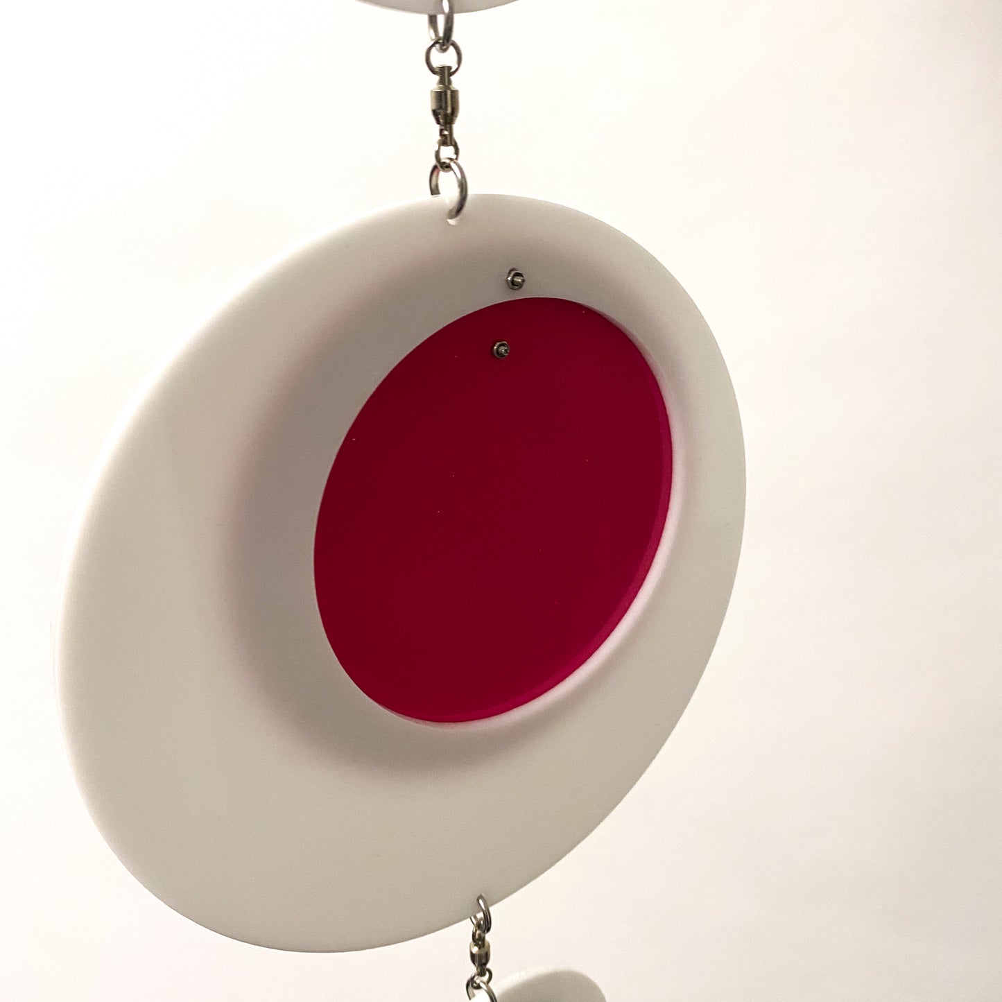 Back view of Groovy DOTS in white, hot pink, and pink mirror by AtomicMobiles.com