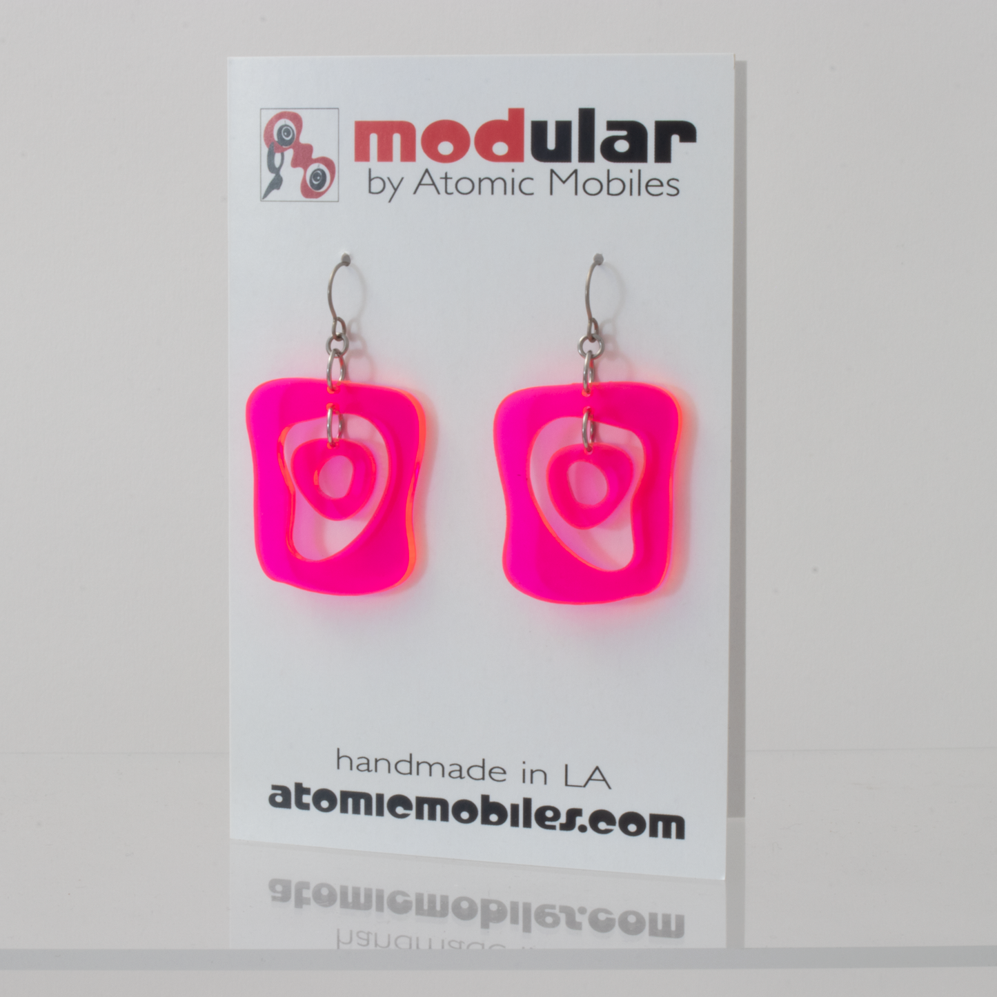 Mid Mod 1960s Mid Century Modern Style Earrings in Neon Fluorescent Hot Pink plexiglass acrylic by AtomicMobiles.com