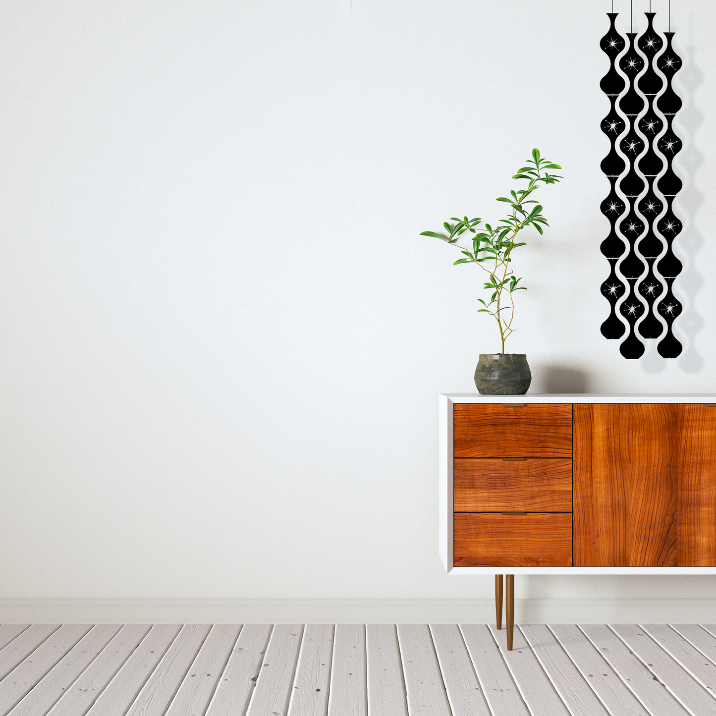 Jeannie Stardust Mid Century Modern black retro hanging art mobile - DIY Kit next to modern credenza - by AtomicMobiles.com