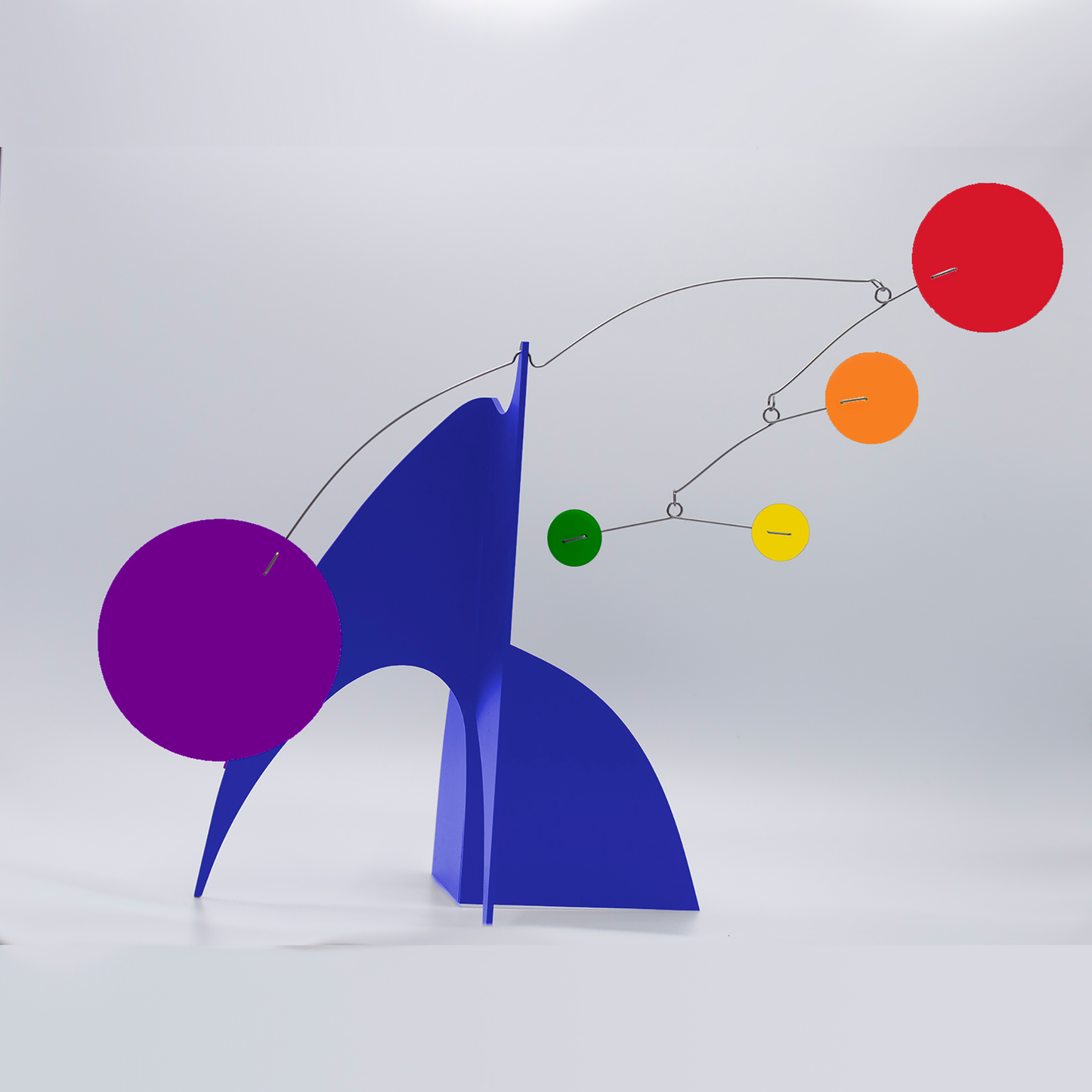 Beautiful Moderne Art Stabile in LGBTQ+ Rainbow Pride colors of navy blue, red, purple, orange, yellow and green - mid century modern inspired abstract modern art - tabletop kinetic art sculpture mobiles hand made with glossy plexiglass acrylic in Los Angeles by Debra Ann of AtomicMobiles.com