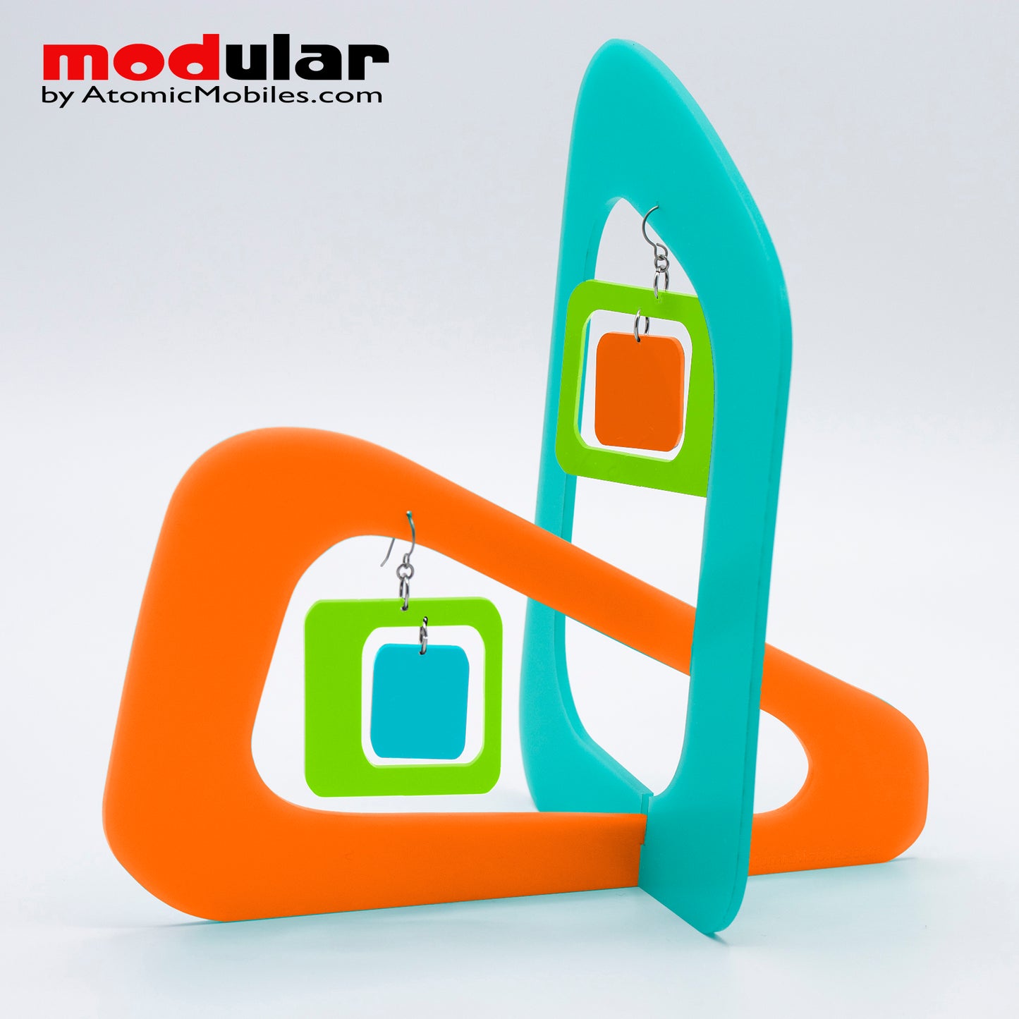 Handmade Coolsville mod style earrings and stabile kinetic modern art sculpture in Palm Springs colors by AtomicMobiles.com