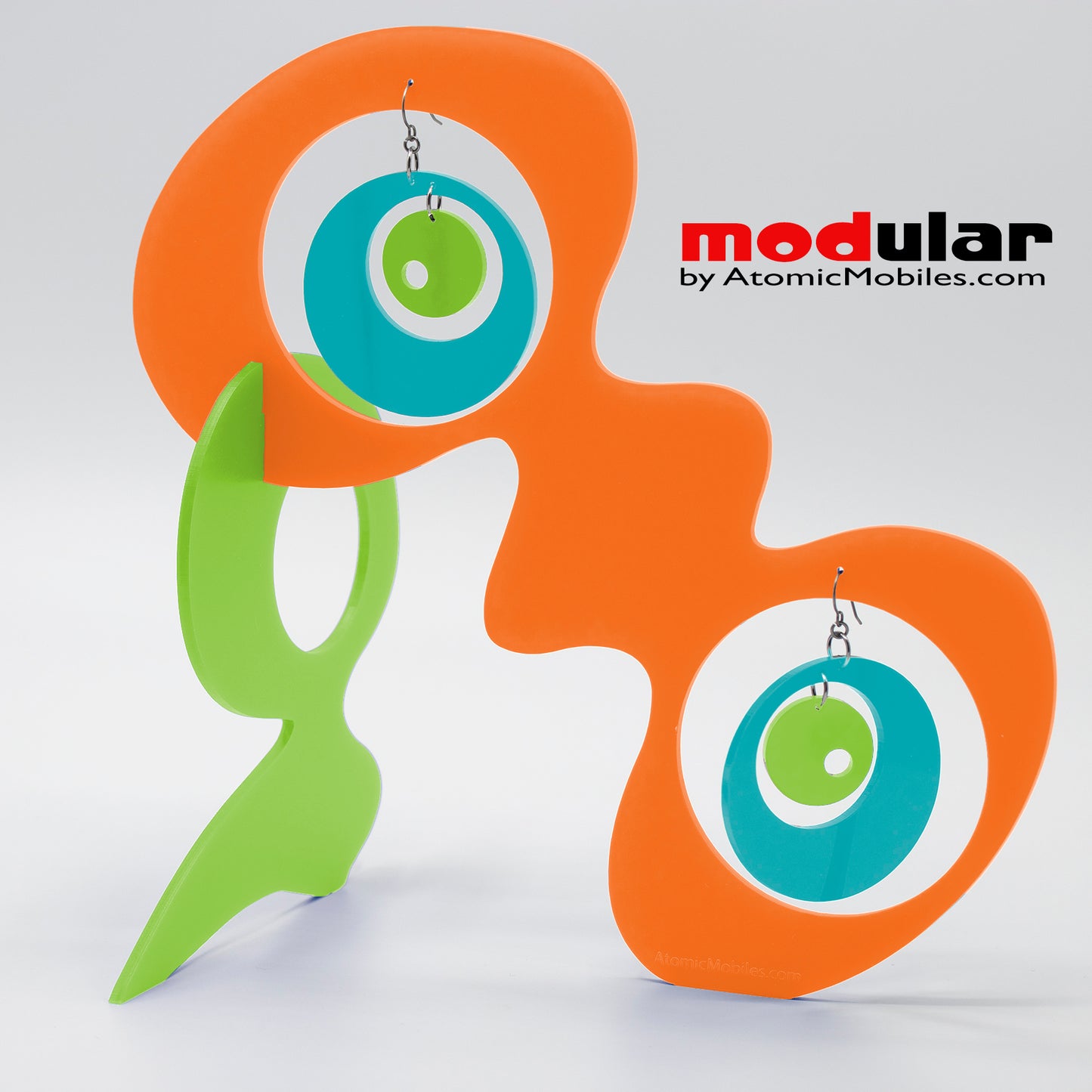 Groovy earrings + stabile art sculpture