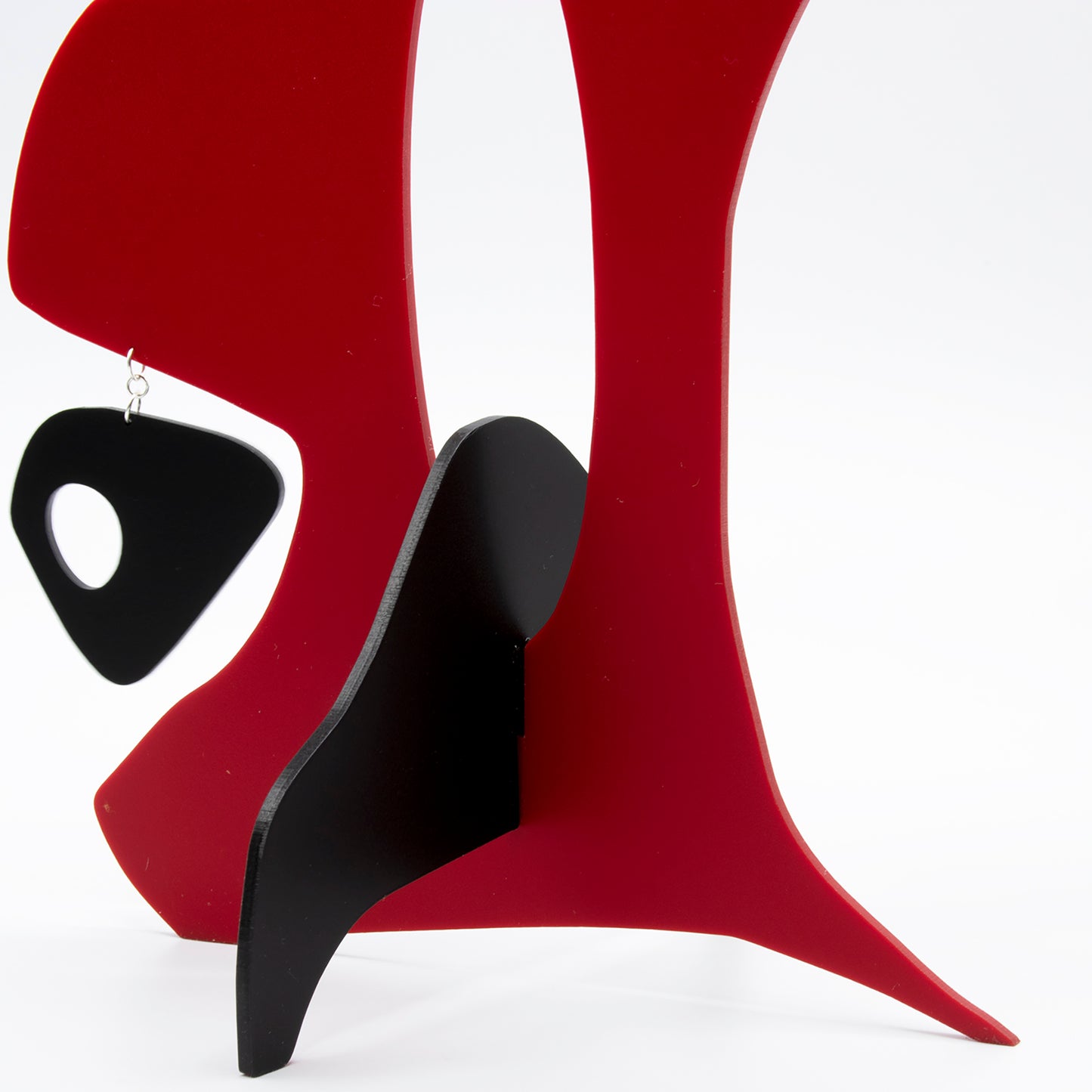 Close up of Le Singe Abstract Kinetic art sculpture by AtomicMobiles.com - interpretation of a monkey animal