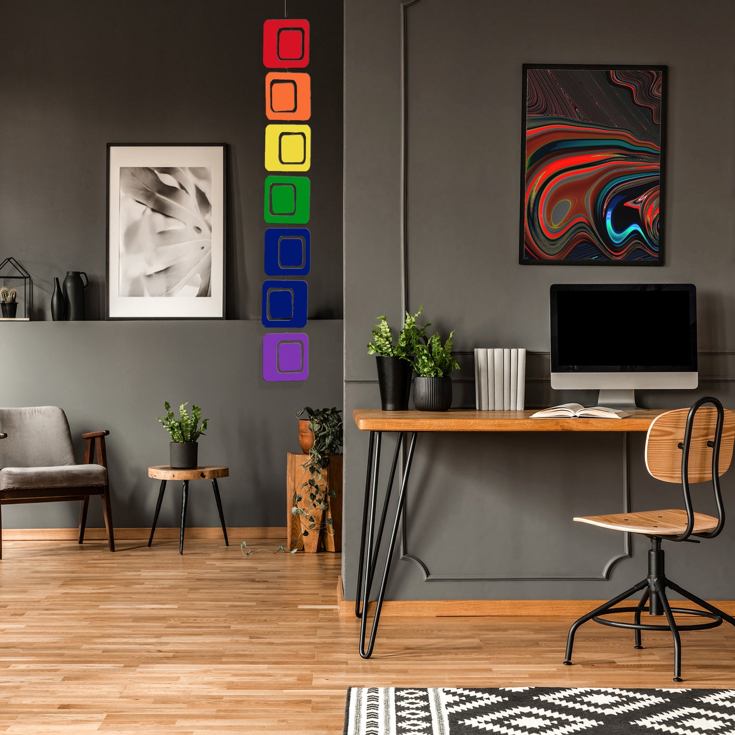 Rainbow Coolsville Vertical Hanging Art Mobile in dark modern room with home office desk and computer by AtomicMobiles.com