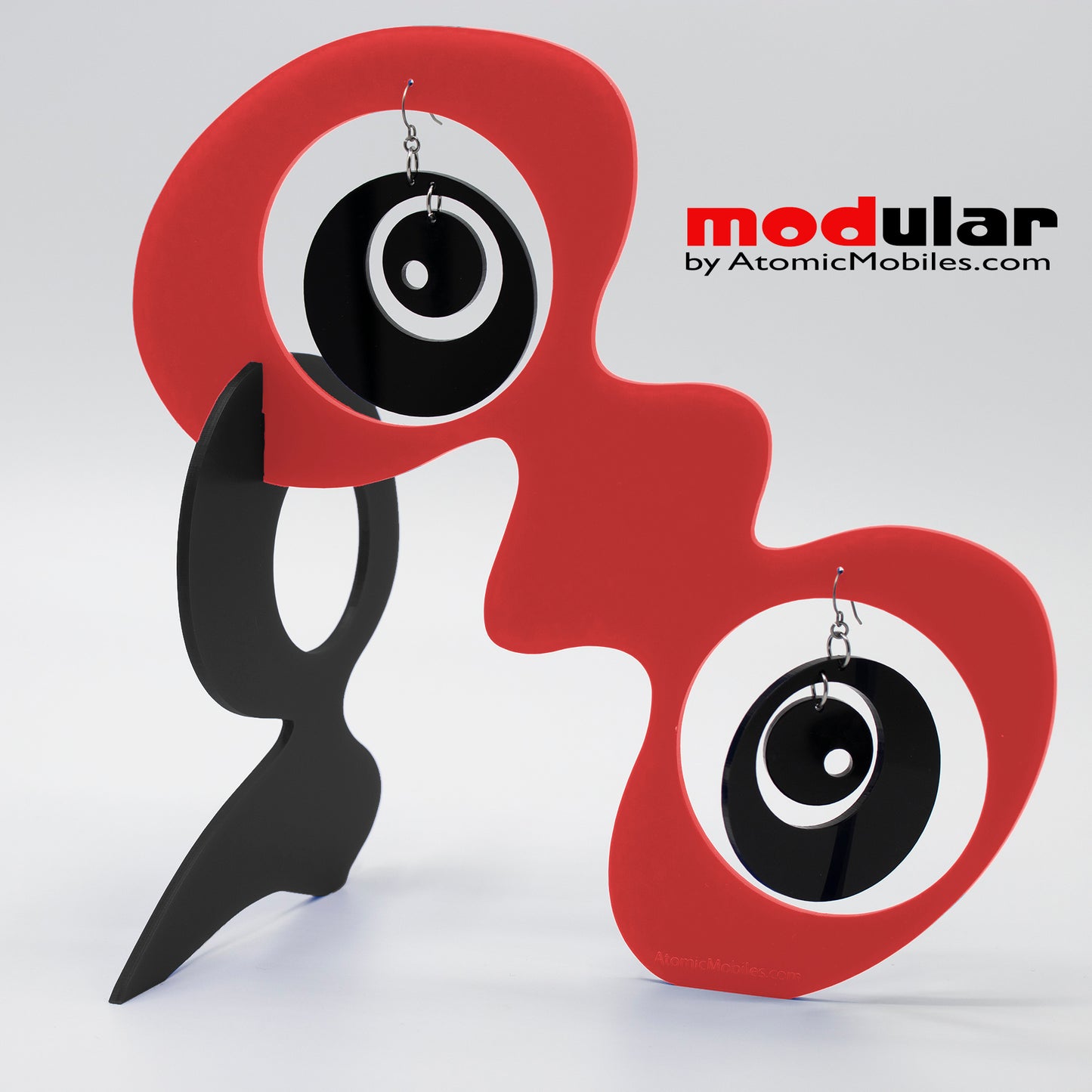 Groovy earrings + stabile art sculpture