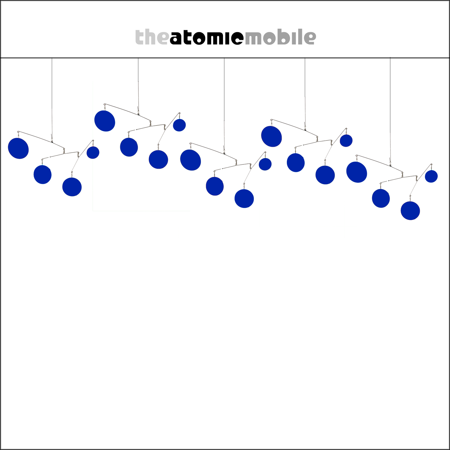 The Atomic Mobile in Navy Blue - kinetic hanging art mobiles for your home and office - by AtomicMobiles.com