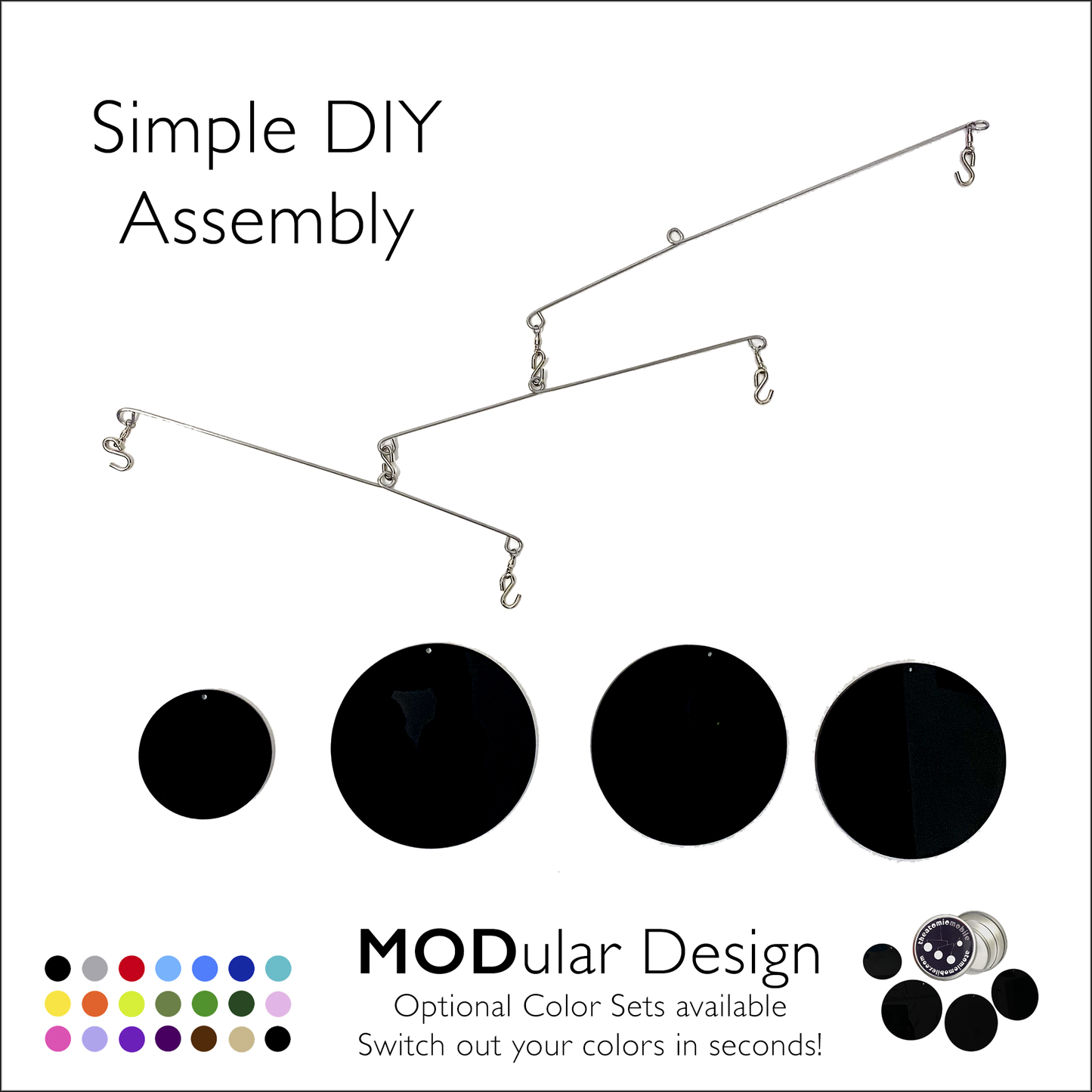 The Atomic Mobile in black - a modular kinetic hanging art system with interchangeable color circles by AtomicMobiles.com