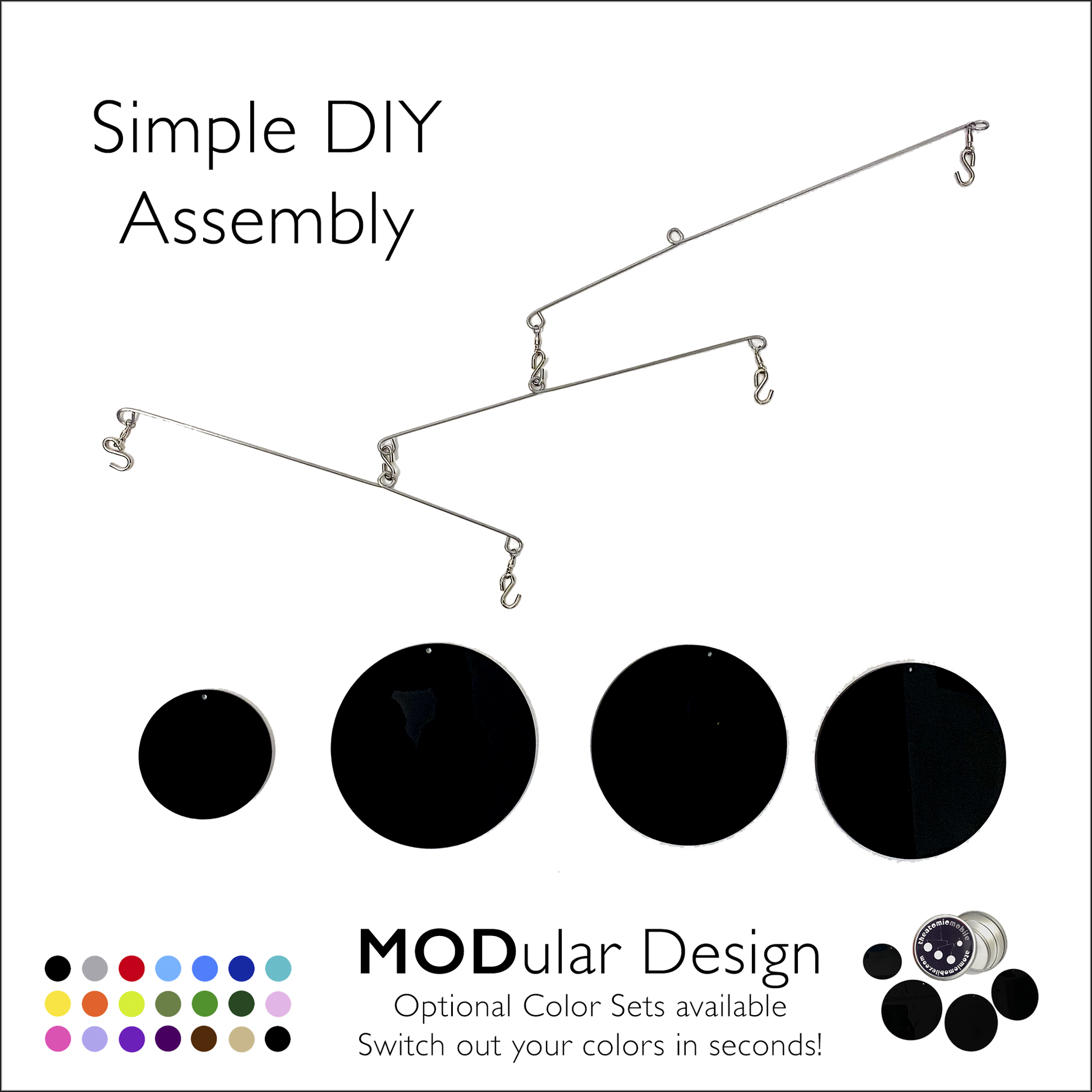 The Atomic Mobile in black - a modular kinetic hanging art system with interchangeable color circles by AtomicMobiles.com