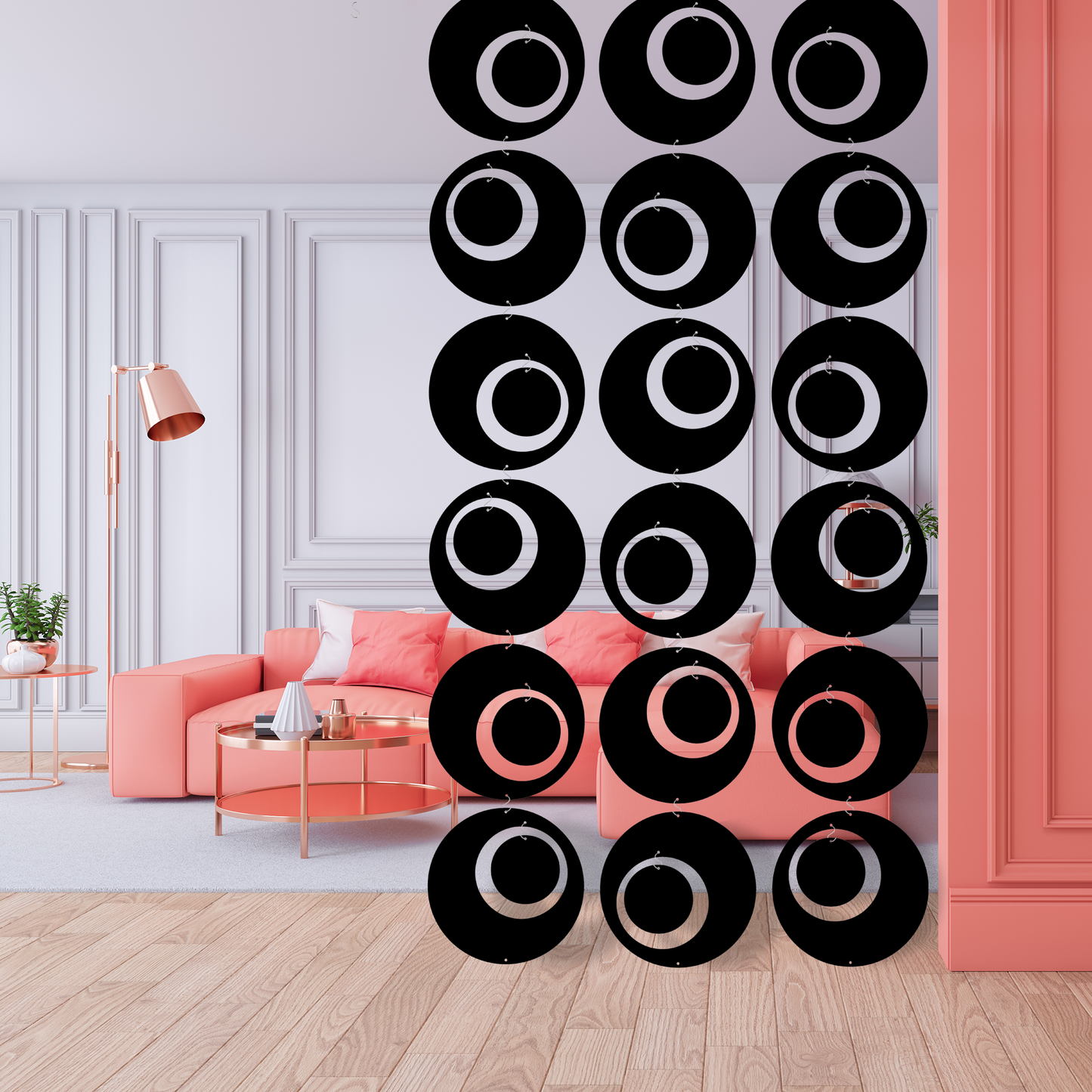 Beautiful modern living room with peach sofa and peach wall with black Groovy XL Groovy Room Divider in black - mid century modern 1960s style hanging kinetic art by AtomicMobiles.com