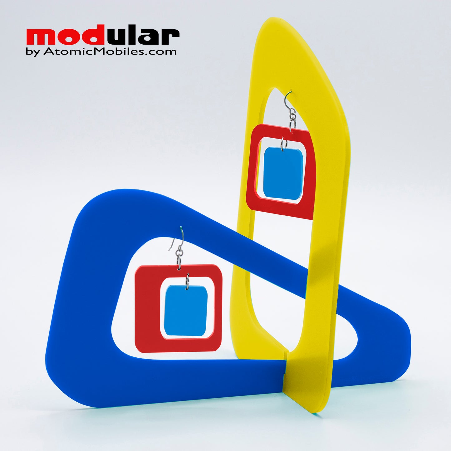 Handmade Coolsville mod style earrings and stabile kinetic modern art sculpture in Yellow, Navy Blue and Red by AtomicMobiles.com