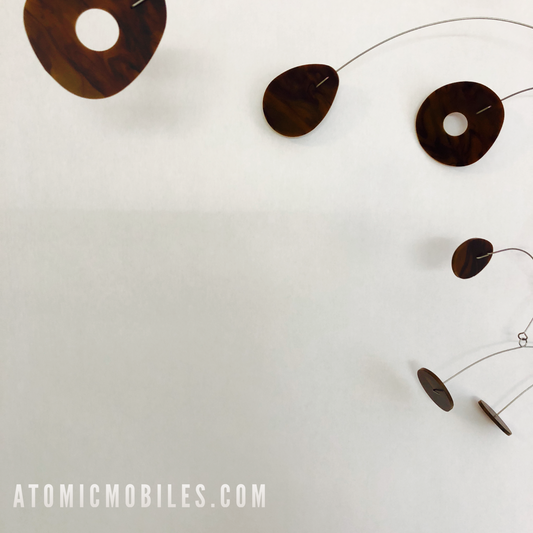 Beautiful tortoise shell mobile by AtomicMobiles.com - inspired by Danish Modern