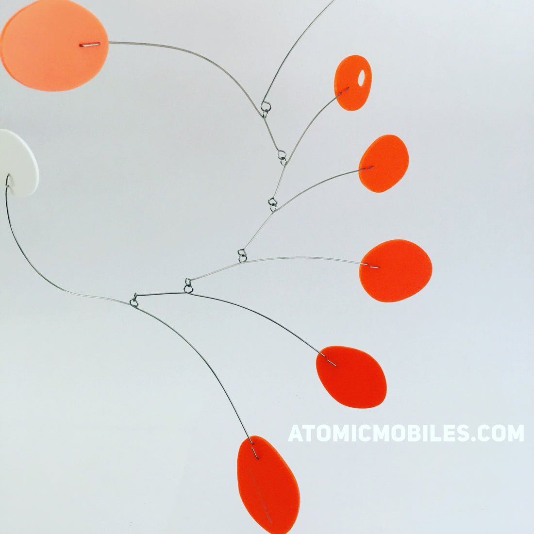 Orange MCM hanging art mobile by AtomicMobiles.com