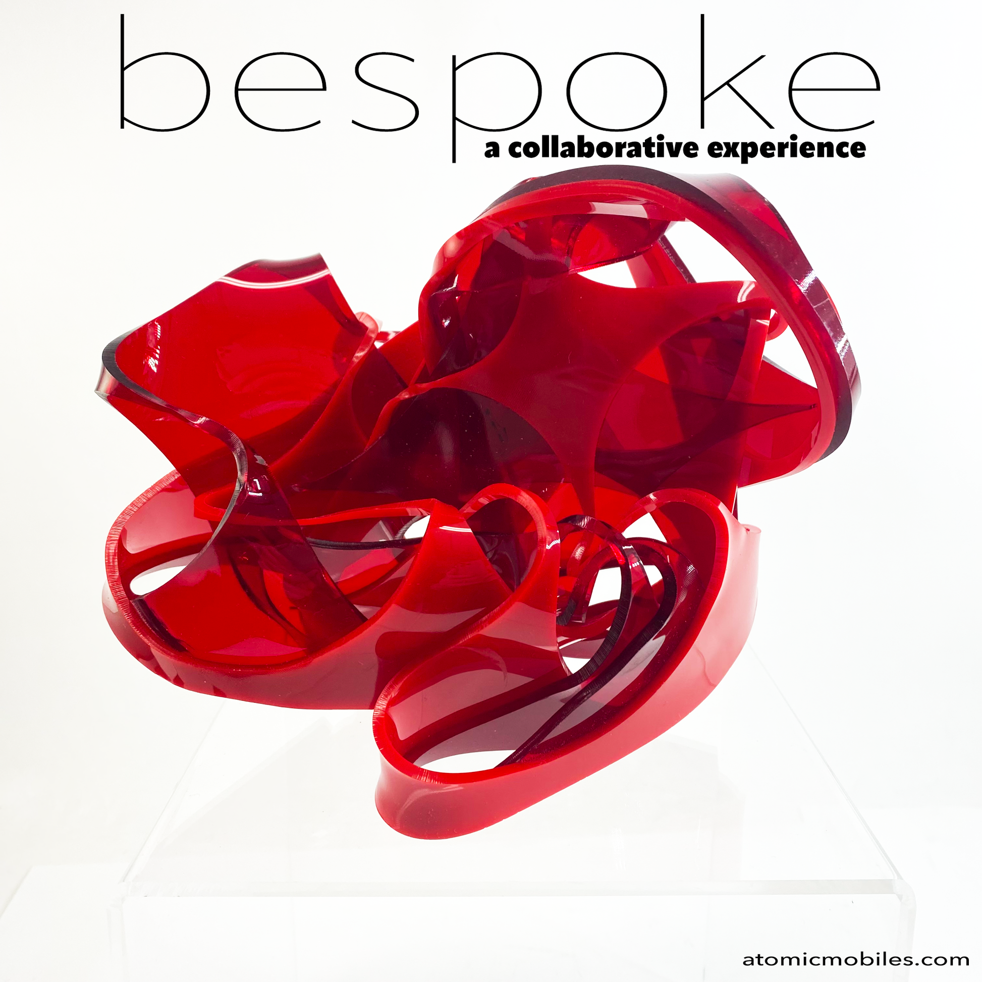 Bespoke is a collaborative experience, multi color art sculpture shown in red . You choose your colors for this modern plexiglass art by AtomicMobiles.com