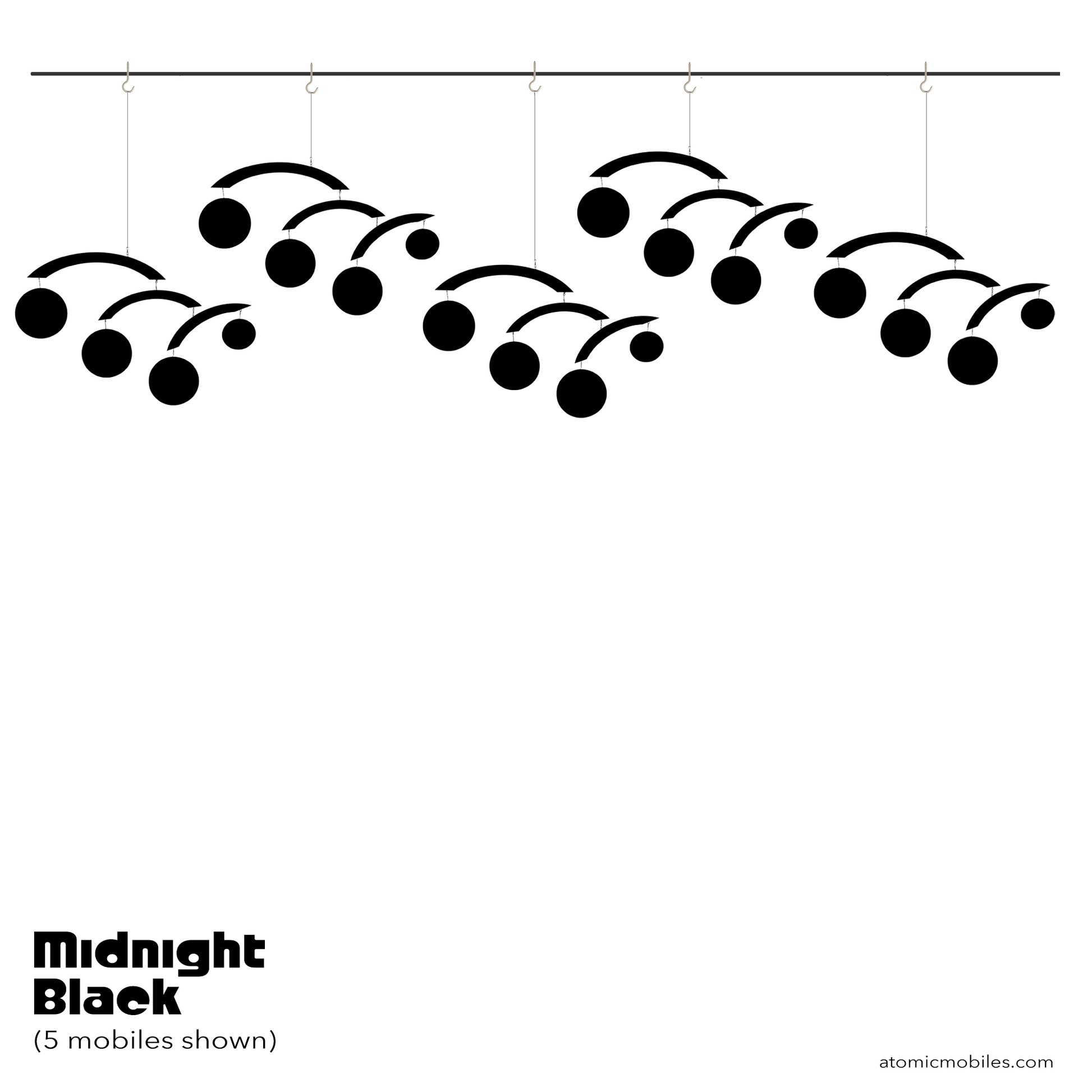 Black decorative Jetsetter hanging art mobiles hanging from a line on a white background with 'Midnight Black' text and 'atomicmobiles.com' website.
