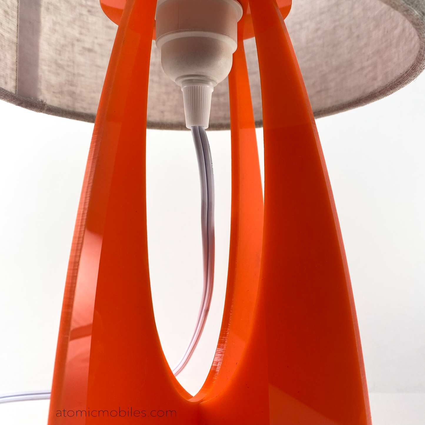 Closeup of orange Beatnik Party Lamp by AtomicMobiles.com