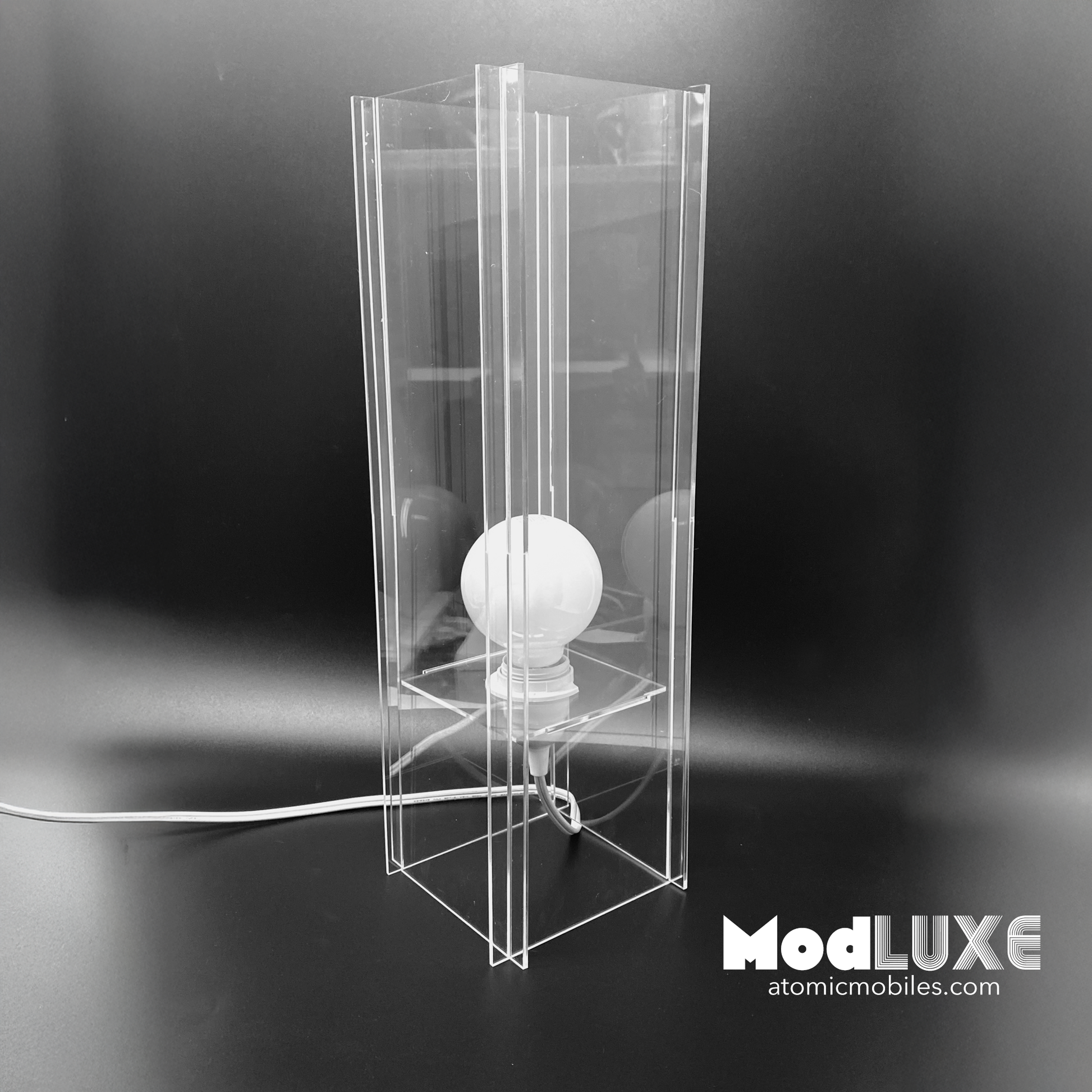 ModLuxe in mod 1970s clear plexiglass acrylic. Retro groovy space age table lamp for modern home decor made by AtomicMobiles.com