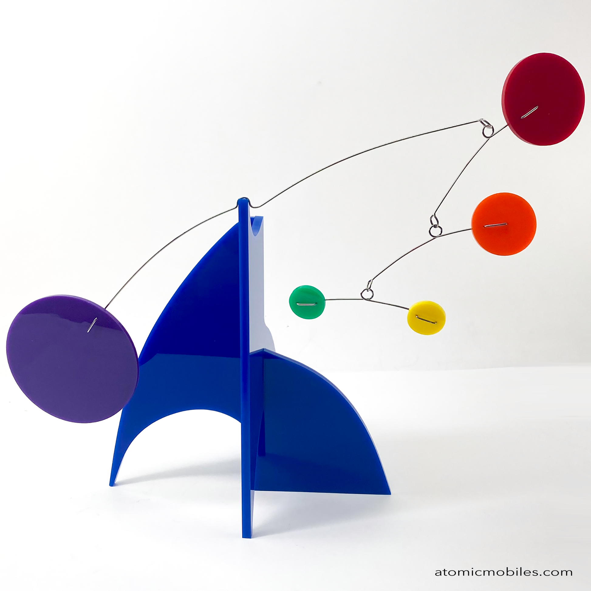 The Moderne Art Stabile Sculpture in rainbow pride LGBTQ+ colors ready to ship today by AtomicMobiles.com