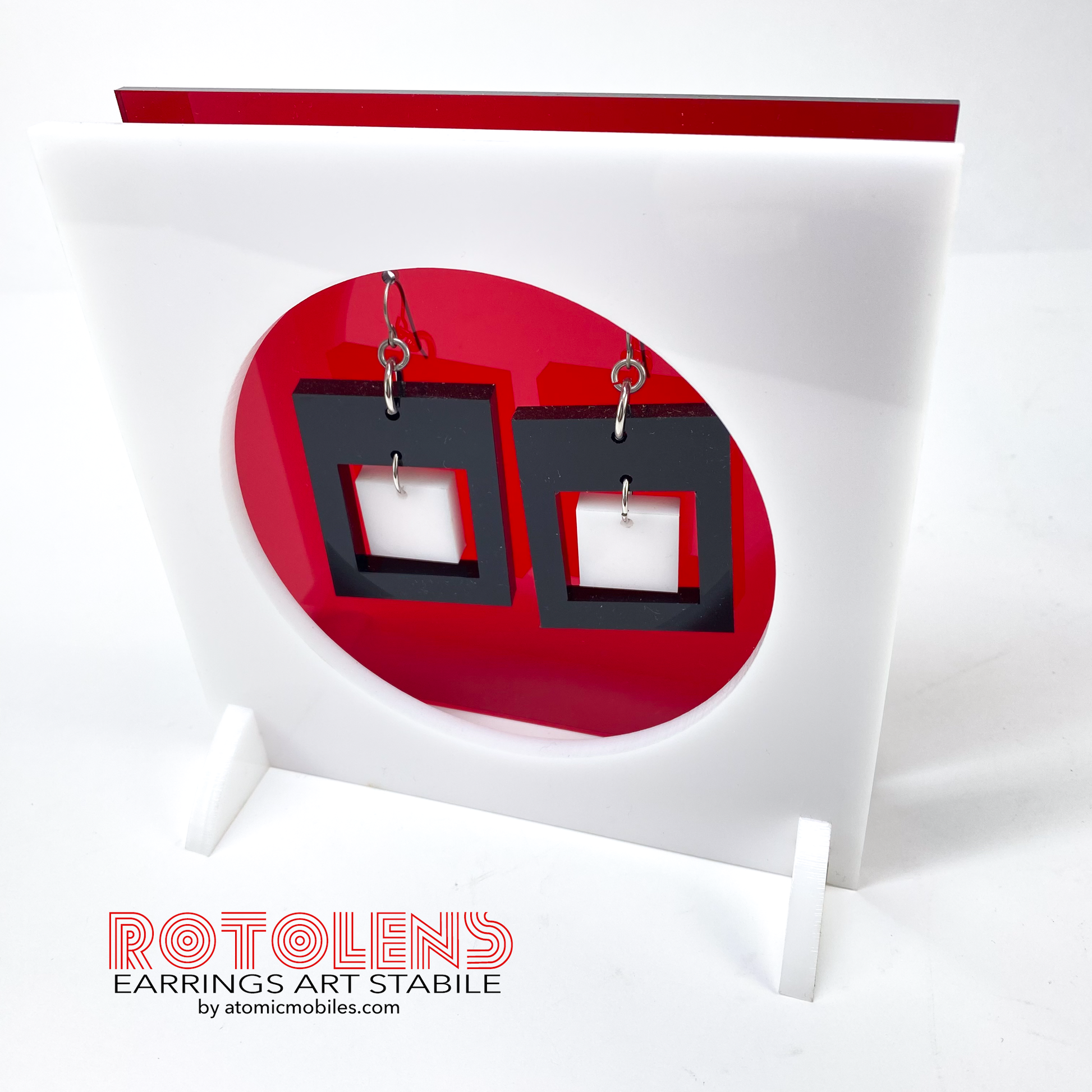 Stunning Art Earrings Stabile Set featuring transparent red backing with black and white earrings - mid century modern art for Groovy People by AtomicMobiles.com