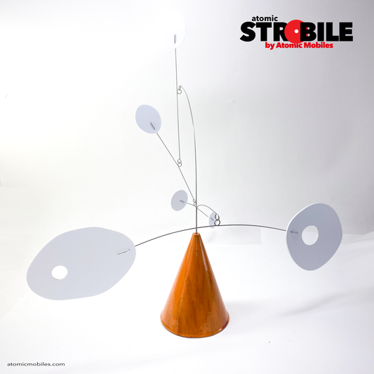 The Strobile kinetic tabletop art stabile mobile sculpture by AtomicMobiles.com featuring one of a kind marbled burnt orange cone base